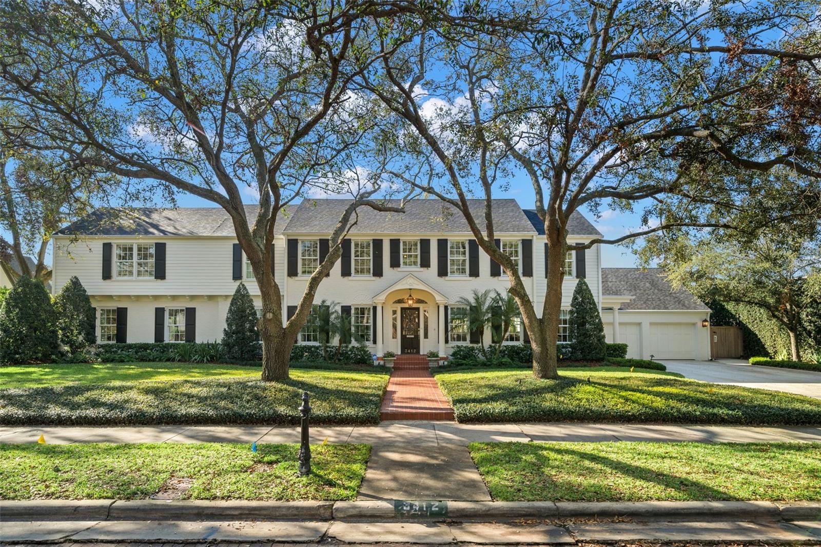 Incredible Golfview Estate that has been beautifully updated by Soleil to live like a new home. Situated on a 132x132 lot, this classically elegant residence boasts 4 bedrooms & 3.5 bathrooms plus an attached guest house with a full bedroom & bathroom. The entry foyer is flanked by the kitchen and the formal dining room with a bar that lend to the easy flow of the home. The newly renovated kitchen is incredibly spacious and features top of the line appliances including double Miele dishwashers, SubZero refrigerator, Wolf stove, ice machine and large center island with seating for 6. Enjoy your coffee in the sitting area in the kitchen that overlooks the front of the home. The office/study is a work from home dream with views of the backyard oasis. Enjoy entertaining in the family room with French doors out to the pool and expansive backyard. Upstairs you will find the owner's retreat with an incredible walk-in closet & bathroom plus 3 additional bedrooms. The guest house is a wonderful place for out of town guests or to enjoy some quiet time away from the main house. The guest house is equipped with a kitchen, large living room, bedroom & full bath. Additional features include: a 700 bottle refrigerated wine room, newer cabinetry and marble/granite counters throughout the house, updated door and cabinet hardware, newer oak floors in the living areas, newer gas fireplace, generator, impact-rated custom wood/aluminum clad windows (2018), hurricane rated garage doors (2018) & roof replaced in 2023. Minutes to Hyde Park, Soho, Downtown, TIA, International Mall, wonderful restaurants, shopping and the Gulf beaches.