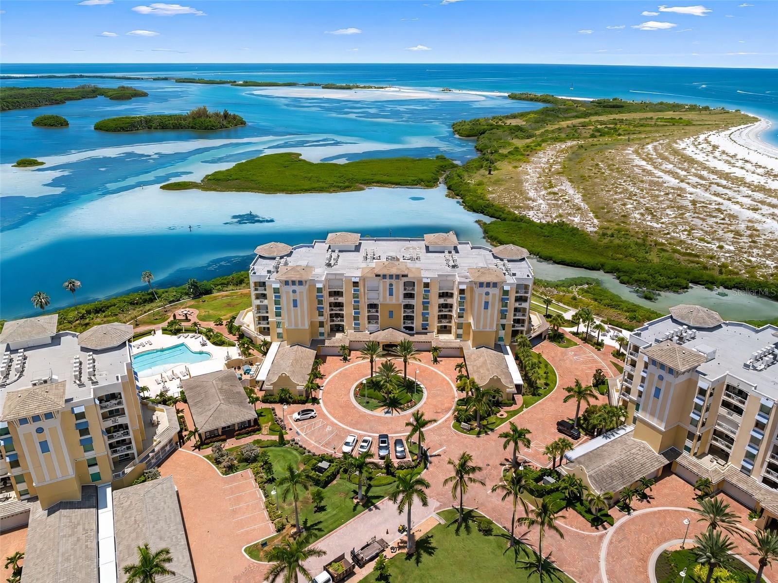 EXPERIENCE THE FINEST IN BEACH FRONT LUXURY LIVING: Sunset Pointe at Collany Key, an exclusive, private gated waterfront enclave where coastal elegance meets resort-style living. This extraordinary residence with private foyer and semi private elevator offers one of the community's most coveted floor plans. Featuring 3 ensuite bedrooms and 3.5 bathrooms, this exceptional home was thoughtfully designed to deliver privacy, comfort, and sophistication. This limited floor plan rarely becomes available, making this an exceptional opportunity. What truly sets this residence apart is its expansive Gulf-front balcony, offering breathtaking views of turquoise waters and unforgettable sunsets. Exclusive to this floor plan, a private staircase with a secured gate provides direct access from your oversized expansive balcony to the pristine beaches and resort amenities below, allowing you to enjoy the beach without ever entering an elevator. The result is a residence that lives with the privacy and ease of an elegant beachfront home while offering the convenience of luxury condominium living. The open floor plan is appointed with custom designer finishes throughout. The gourmet kitchen features premium stainless-steel appliances, custom cabinetry with glass accents, stone countertops, and an elegant wine bar designed for effortless entertaining. Expansive sliders invite abundant natural light while perfectly framing spectacular Gulf vistas and nightly sunsets. A private theater room offers the perfect setting for movie nights, sporting events, or simply unwinding in the comfort of your own luxury retreat. The primary suite is a Gulf Front Sanctuary, where breathtaking water and beach views greet you each morning. Imagine waking to the sight of dolphins playing offshore before stepping onto your expansive balcony to enjoy coffee as the waves gently roll onto the shore. The spa-inspired primary bath creates a luxurious escape with a deep soaking tub, oversized walk-in shower with multiple shower heads, dual vanities, and beautifully crafted custom cabinetry. This luxurious community offers an exceptional collection of resort-caliber amenities, including a geothermal waterfront pool and spa, private beach access, waterfront boardwalk, fishing dock, kayak launch, state-of-the-art fitness center, bocce ball courts, putting/chipping green, covered outdoor kitchen with grilling stations, gas fire pits, and a private dog park. This residence is adjacent to the pristine 1,800-acre Shell Key Preserve, one of Florida's most treasured natural coastal sanctuaries. Explore miles of unspoiled beaches, crystal-clear Gulf waters, and protected wildlife habitat while enjoying beach walks, kayaking, paddleboarding, shelling, and unforgettable sunsets. Downtown St. Petersburg, South Tampa, world-class dining, shopping, art galleries, museums, and vibrant waterfront entertainment are all just minutes away. This location offers effortless access to three international airports, private aviation facilities, marinas, golf, and tennis. Additional features include a private garage, assigned parking, and a climate-controlled storage locker for convenience and ample storage. This is far more than a luxury residence; it is an opportunity to own one of the Gulf Coast's most exclusive beachfront properties. Offering privacy, timeless elegance, extraordinary amenities, and a lifestyle few will ever experience, this is coastal luxury at its finest. Call for your private showing