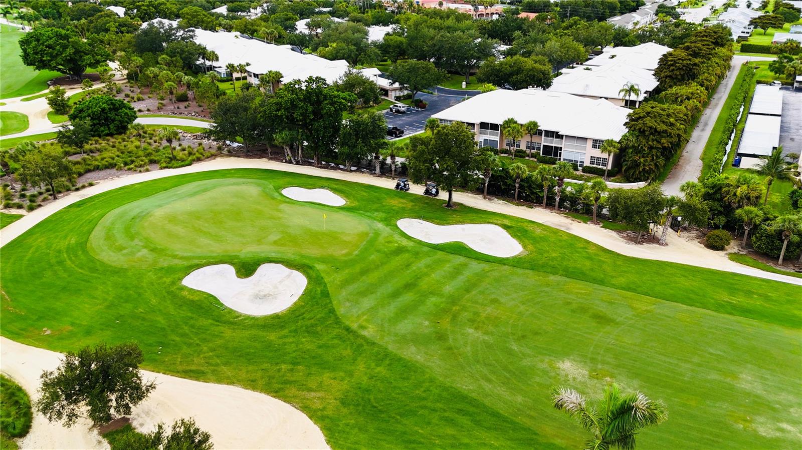 Welcome to this spacious 3 bedroom, 2 bath condo offering beautiful golf course views of the 10th fairway at Cypress Lake Country Club. 9' ceilings throughout, along w/ 8' sliders create an open, airy feel throughout, complemented by ample natural light and tile and vinyl flooring. The eat in kitchen and dining area flow into a large family room overlooking the golf course, an ideal spot to relax and take in the view. The generous primary suite features a beautifully updated bath with dual sinks and a walk in closet, while two additional bedrooms offer flexible space for family, guests, or a home office. Additional highlights include interior laundry, a screened front entry, and a carport with an assigned storage closet, plus ample guest and visitor parking. Cypress Lake Country Club offers a true resort style lifestyle with a clubhouse featuring a community room and kitchen, a community pool and spa, and access to the golf course, all set within beautifully maintained, tree lined grounds just minutes from Fort Myers' shopping, dining, and beaches. Combining spacious living, peaceful golf course views, and an amenity-rich community, this home offers the perfect setting to enjoy the Southwest Florida lifestyle.