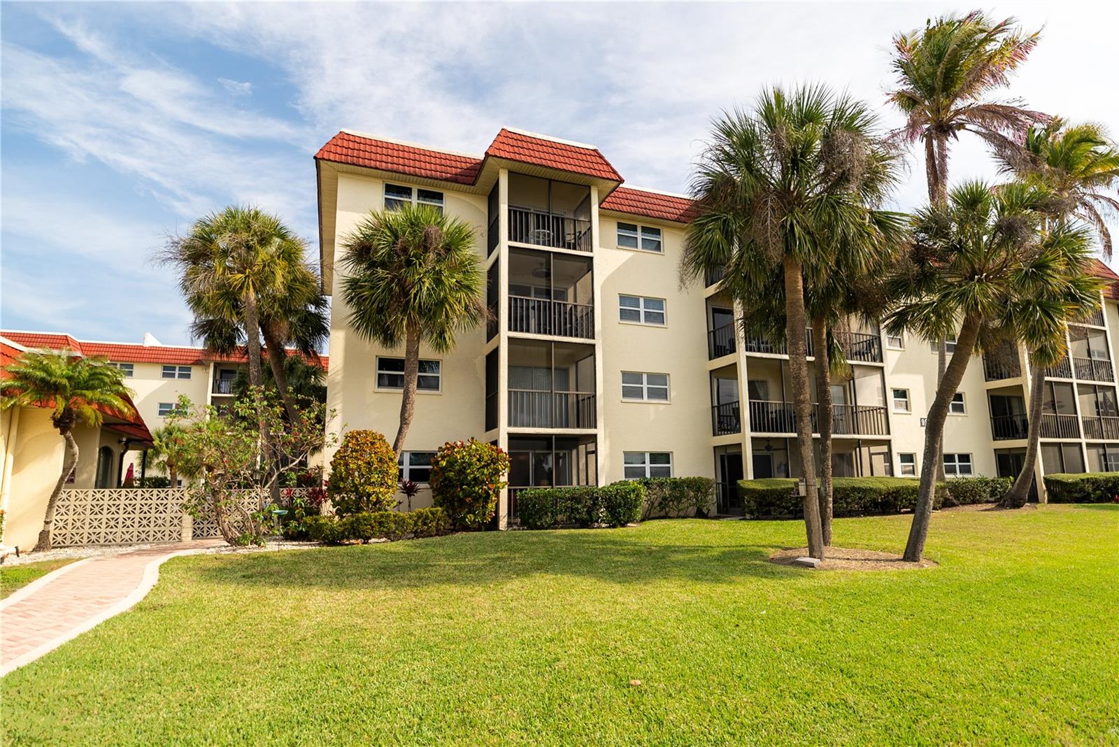 Located directly across the street from world-famous Siesta Key Beach—recently ranked the #1 Beach in the United States and among the top beaches in the world— this residence offers exceptional convenience and effortless access to the sand. Simply walk to the beach in approximately five minutes—no driving, no searching for parking, just easy coastal living. Enjoy morning walks and evening sunsets on Siesta Key Beach just steps away.

This 2-bedroom, 2 full bath residence offers approximately 940 square feet of comfortable living space with an open layout designed for relaxed island living. The updated kitchen features wood cabinetry, granite countertops, and stainless steel appliances, flowing seamlessly into the dining and living areas. Tile flooring throughout provides durability and easy maintenance, while the split-bedroom floor plan allows for privacy between residents and guests.

One of the largest 2-bedroom, 2 full bath floor plans in the community, competitively priced at $593,000. Weekly rentals are permitted, offering outstanding flexibility for both personal use and income potential. Onsite property management is available, making guest coordination and rental operations easy and convenient. Covered parking is included, along with ample guest parking.

La Siesta residents enjoy access to a heated pool, fitness room, clubhouse, and beautifully maintained grounds. Located just minutes from Siesta Key Village’s restaurants, shopping, and entertainment, this property offers the ideal balance of relaxation and accessibility.

Whether you’re searching for a personal beach retreat, seasonal residence, or an income-producing investment, this location delivers the lifestyle buyers and vacationers come to Siesta Key to enjoy.