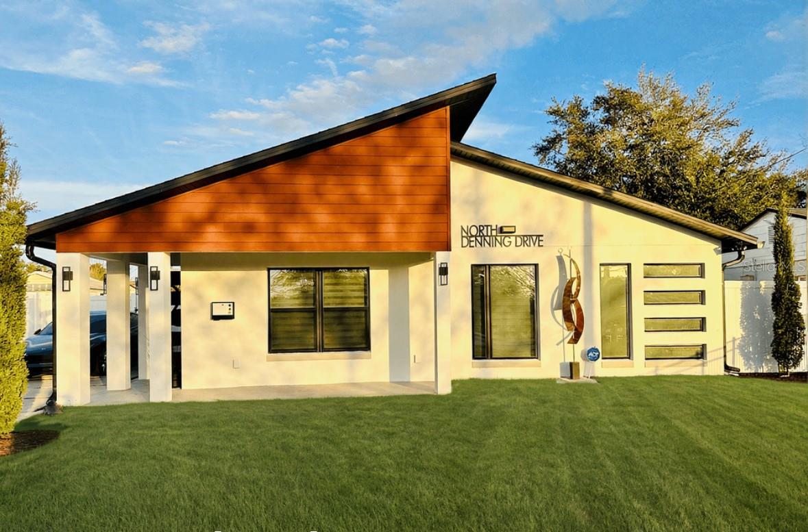 **NEW CONSTRUCTION QUALITY | WALKABLE WINTER PARK | DESIGNER SMART HOME**

This is not a remodel — it's a complete architectural transformation completed in September 2022. Taken to the slab and studs, this Winter Park residence was entirely rebuilt with new roof trusses, all-new electrical, new AC system (inside and out), tankless water heater, new plumbing, and smart irrigation — delivering true new construction quality in an established neighborhood. Located steps from Winter Park Village, Park Avenue, Whole Foods, Starbucks, Publix, cinema, restaurants, and more.

Arrive home to a grand 51' custom driveway flanked by mature Italian cypress trees, sculptural landscaping, and elegant iron railing — pulling directly to your covered front porch entry. No garage means no wasted space — just a clean, architectural arrival experience designed to impress.

Inside, light-filled interiors with soaring 6" baseboards, full custom tile flooring, and an abundance of natural light create a gallery-like aesthetic that feels curated, not cookie-cutter. Custom liner windows in the dining room and primary suite flood the home with natural light while adding unmistakable architectural character.

**The Kitchen:**

- Designer floating shelves
- Smart range and under-counter built-in microwave
- Under-cabinet and island LED lighting
- Decorative pendants and ambient lighting throughout

**The Primary Suite:**
A private retreat with ceiling-mounted rain shower and spa-like finishes designed to decompress after a walkable night out on Park Avenue.

**Smart Home Ready:**

- New AC system (inside and out) with smart thermostat
- Tankless water heater and fully new plumbing
- Smart lock entry
- Google Nest doorbell with two-way audio
- Smart soffit exterior lighting
- Weather-monitored smart irrigation

**Out Back:**
A fully private PVC-fenced backyard sanctuary — spacious enough for pets, entertaining, and room to roam. A covered porcelain tile patio plus a separate fire pit slab make this an outdoor living extension you'll actually use year-round in the Florida lifestyle.

Over 300 sq ft of additional space was added to accommodate two additional bathrooms, interior laundry, and a layout built for real life — including a new stacked washer and dryer.

Properties combining true gut-renovation quality, luxury designer touches, smart technology, and this rare walkable Winter Park address don't last. Move-in ready — and built to last for decades.