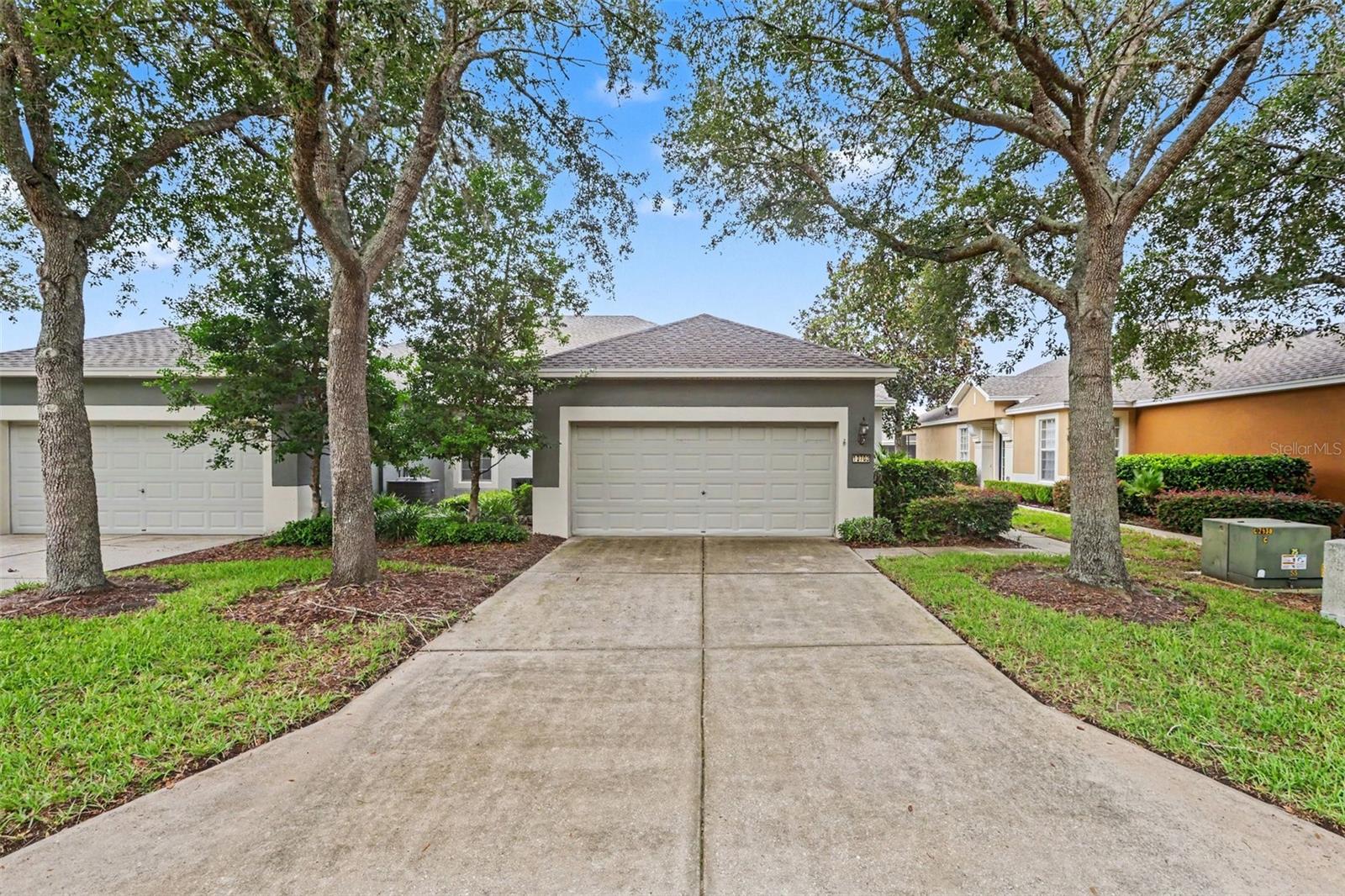 Welcome home to this beautiful 2-bedroom, 2-bathroom villa with a 2-car garage located in the highly desirable Lakeside community. From the moment you step inside, you'll appreciate the bright, open-concept design, soaring sense of space, and inviting atmosphere that make this home perfect for both everyday living and entertaining. Just off the foyer, you'll find a versatile den that can easily serve as a home office, library, hobby room, or additional sitting area to fit your lifestyle. The spacious laundry room offers exceptional functionality with a utility sink and ample storage space. The thoughtfully designed split-bedroom floor plan provides privacy for both owners and guests. The generously sized secondary bedroom is conveniently located near the guest bathroom, which features a relaxing soaking tub. At the heart of the home is the expansive kitchen that seamlessly overlooks the living area, creating the ideal space for gathering with family and friends. The kitchen is equipped with a full appliance package, abundant cabinetry, a large pantry, and a center island with additional seating, making meal preparation both convenient and enjoyable. Adjacent to the kitchen is a dedicated dining area perfect for everyday meals or hosting dinner guests. The spacious living room is filled with natural light and opens through sliding glass doors to a large screened lanai, offering the perfect place to enjoy your morning coffee, unwind in the evenings, or entertain while taking in the peaceful surroundings. The generous primary suite provides a private retreat with a large walk-in closet and an en-suite bathroom featuring dual vanities and a walk-in shower. Offering comfort, functionality, and low-maintenance living in one of the area's most sought-after communities, this villa is ready for you to make it your own. Don't miss your opportunity to call this beautiful property home—schedule your private showing today!
