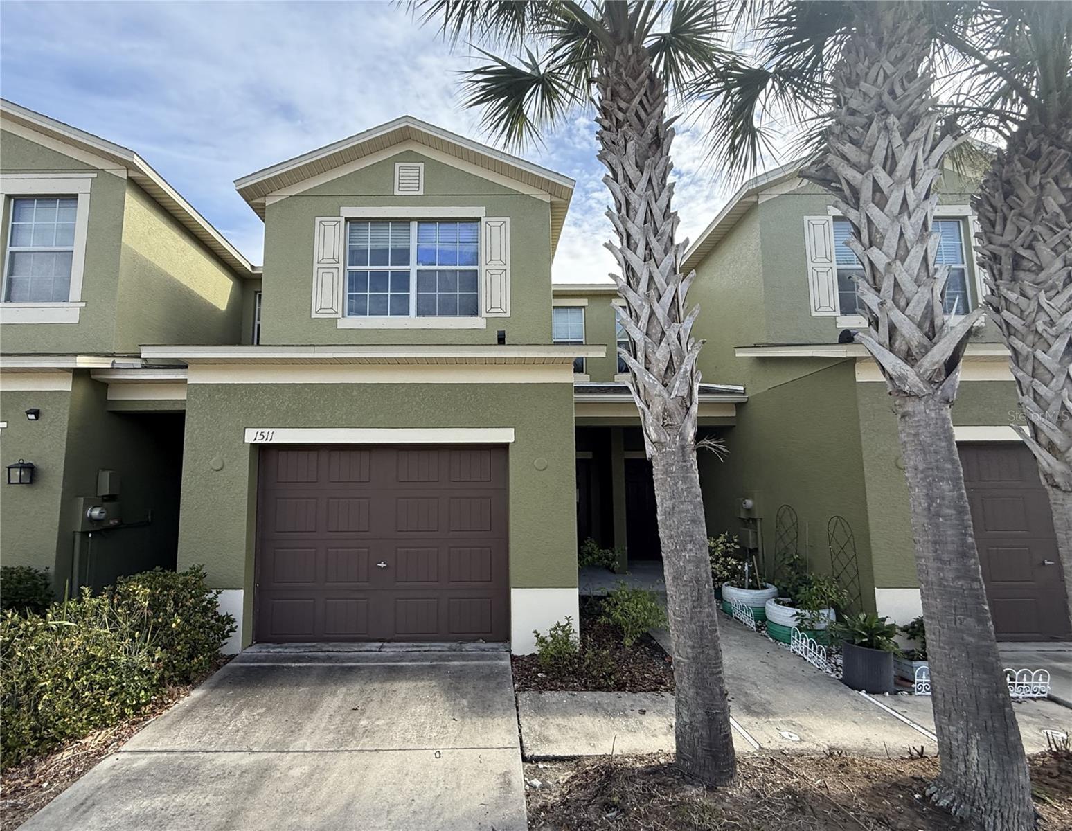 Welcome to the gated Hawk's Point West Community! This two story townhome features 3 bedrooms, 2.5 bathrooms, 1,749 square feet of living space, private 1 car garage and pond views. Step inside to an open concept layout with the kitchen and spacious living and dining area that feels bright and welcoming, perfect for everyday living or hosting friends and family. The kitchen offers generous cabinet and counter space, a large closet pantry and island with eat up seating. Sliding doors lead to a nice sized screened lanai with pond views. A 1/2 bathroom completes the downstairs - perfect for guests. Upstairs, find the two secondary bedrooms sharing a full bathroom. The primary suite is also located upstairs and includes walk in closet, dual sinks and step in shower. Enjoy the security of a gated community along with easy access to the interstate, shopping, dining and everyday essentials. It’s good to be home. This property may qualify for Seller Financing (Vendee).