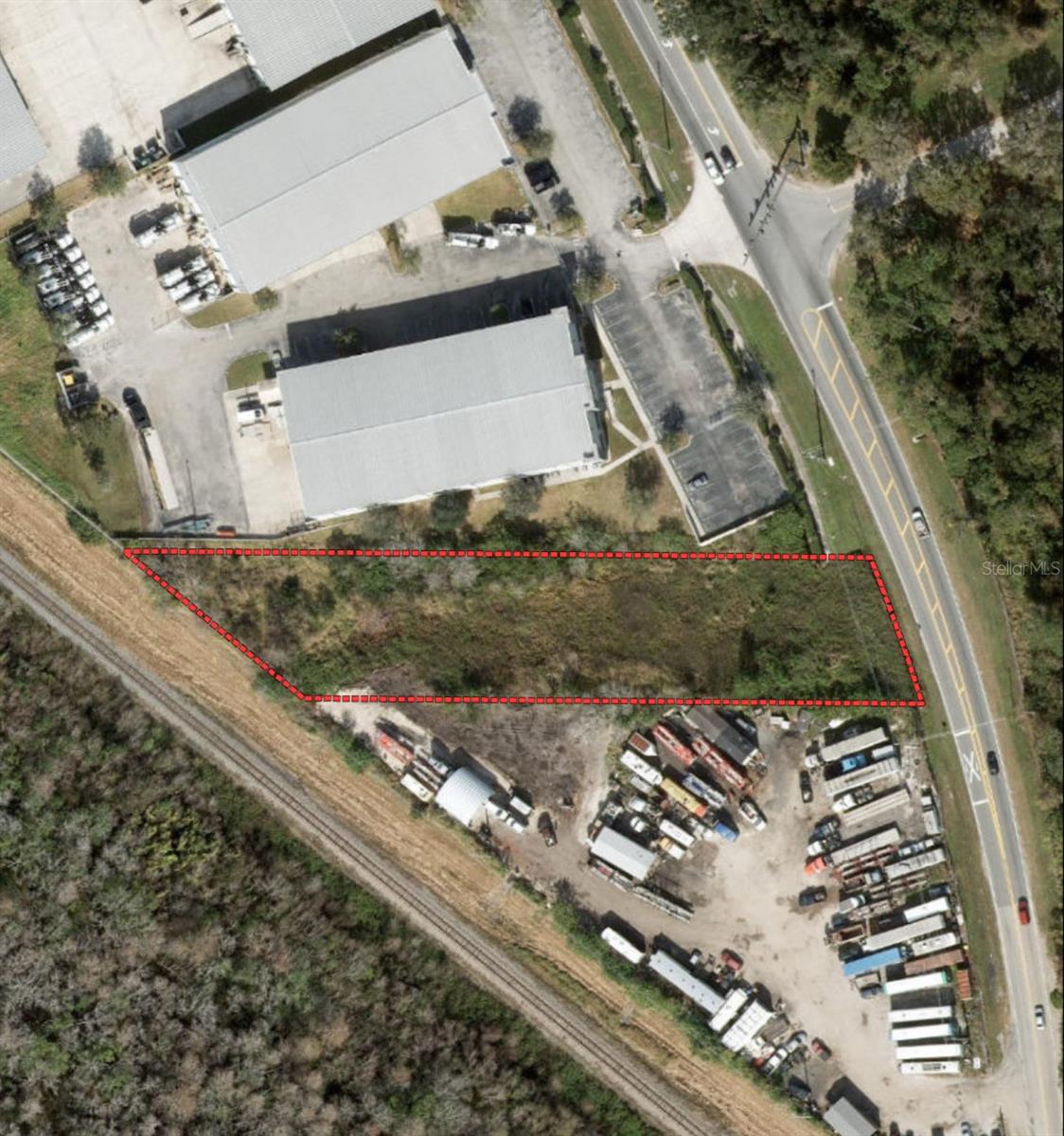 Industrial lot for sale located at  Boggy Creek Road, Orlando, FL 32824, offering approximately 1.08 acres of land zoned Industrial General (I-G). This site features direct frontage on Boggy Creek Road, providing quick and convenient access to major highways and Orlando International Airport, making it ideal for warehouse, light manufacturing, or service facility development. Utilities including electricity, public water, and sewer are available, and engineered development plans are already in place. This property is situated in the growing Meadow Woods industrial corridor, surrounded by infrastructure and commercial growth.