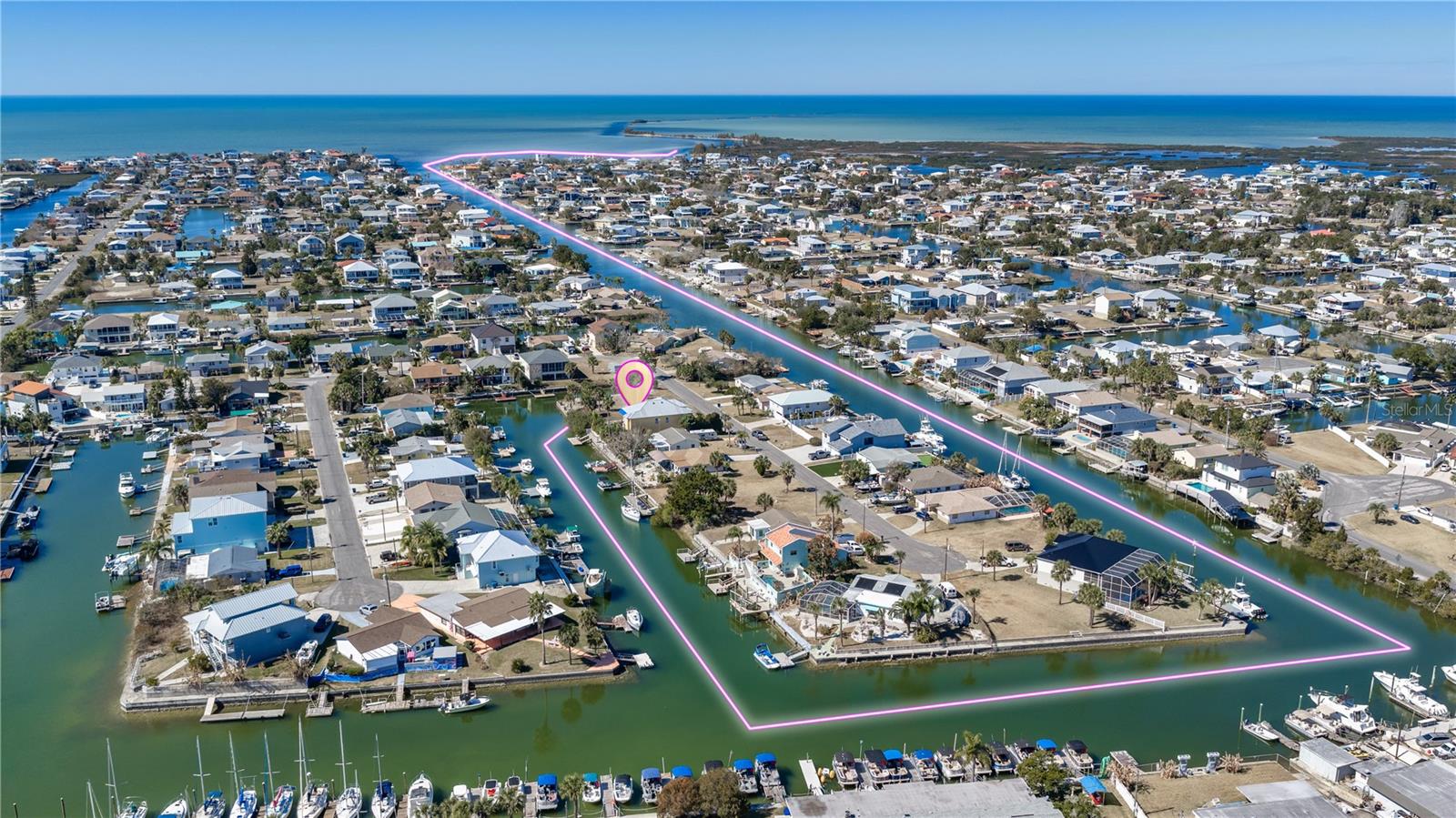 DIRECT GULF ACCESS waterfront lot in the heart of HERNANDO BEACH! This 6,000 SF (60x100) homesite is perfectly positioned on a DEEP WATER CANAL with quick access to the OPEN GULF—offering the ideal opportunity to build your DREAM COASTAL HOME in one of Florida’s most desirable waterfront communities. With NO HOA, NO DEED RESTRICTIONS, and NO SHORT-TERM RENTAL RESTRICTIONS, this property offers endless flexibility for a primary residence, vacation getaway, or investment opportunity.
Zoned R1B for SINGLE-FAMILY HOMES only (no mobile homes permitted). Property is located in a flood zone, so any future home will need to be ELEVATED. There is NO TIMELINE TO BUILD, allowing you to secure your piece of paradise now and build when ready. Water, sewer, and electric are available at the street and can be connected to the future home.
Boating enthusiasts will love that DOCKS ARE ALLOWED even without a home currently on the property, making it easy to start enjoying the waterfront lifestyle right away. Please note this is NOT an RV lot and RV living is not permitted.
Located in the charming coastal community of HERNANDO BEACH, residents enjoy easy access to boating, fishing, kayaking, paddleboarding, and some of Florida’s best waterfront dining with live entertainment. Nearby attractions include Weeki Wachee Springs State Park, where you can enjoy crystal-clear springs, kayaking adventures, and Florida’s natural beauty. Conveniently located near shopping, restaurants, marinas, and everyday essentials while still offering the peaceful charm of Old Florida living.
Don’t miss this rare opportunity to own a WATERFRONT LOT with DIRECT GULF ACCESS in beautiful HERNANDO BEACH! Property is located on the right side of the road before 4354 Tahiti Drive. Land financing options are available. Lot lines shown in aerial photos are approximate.