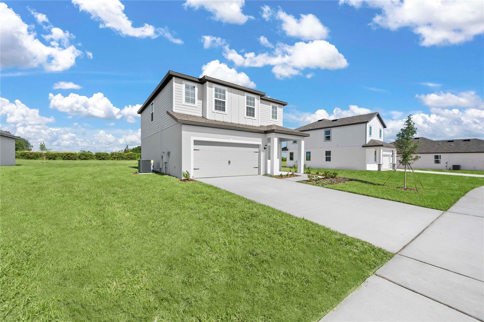 Under Construction. Welcome to the highly sought-after Driftwood floor plan, a thoughtfully designed two-story home that offers exceptional space, functionality, and modern comfort. This inviting layout features four generously sized bedrooms, two full bathrooms, and a bright, versatile upstairs loft that’s perfect as a media room, home office, game room, or bonus living space—giving your family endless possibilities.
The heart of the home is the expansive open-concept living area, where the chef-ready kitchen flows seamlessly into the dining and family rooms. The kitchen impresses with beautiful granite countertops, a large walk-in pantry, and a full suite of brand-new Whirlpool® stainless steel appliances. Whether you’re preparing everyday meals or hosting friends, this space makes both cooking and entertaining a pleasure.
Step outside to the covered back patio, an ideal extension of your living space for relaxed evenings, weekend barbecues, or simply enjoying the outdoors.
Upstairs, the private master retreat is a true sanctuary filled with natural light, boasting a spacious walk-in closet and a luxurious en-suite bathroom featuring a dual-sink vanity and a relaxing step-in shower.
Additional highlights include a two-car garage, energy-efficient upgrades throughout, and the desirable CompleteHome™ Interior Package with 36” upper wood cabinets, elegant crown molding, and stylish modern finishes.
Best of all, this home sits on an oversized homesite with no rear neighbors, delivering exceptional privacy and a spacious, open feel.
 Enjoy exceptional value and lower monthly costs with NO CDD fees in this beautiful community! The Driftwood floor plan truly delivers the perfect blend of style, space, and comfort—ready for you to call it home.