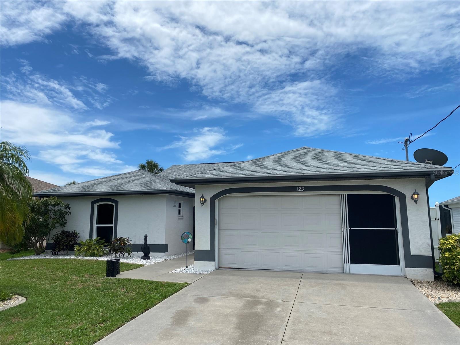 Experience the ultimate Florida lifestyle in this stunning lakeview Rotonda West pool home. This home has a 3 year old roof so no worries. Did I mention newer windows. Nestled in the coveted Flood Zone X, this 3 bedroom 2 bath residence offers a perfect blend of modern security and resort-style relaxation. The heart of the home is a brand new chef's kitchen featuring sleek quarts countertops, brand new stainless appliances, and a social breakfast bar that flows seamlessly into the open floor plan with soaring ceilings. Step outside to your private, heated pool oasis, with a new pool pump, covered lanai, perfect for "grilling and chilling" year round. Sit quietly by the pool and enjoy a lakeview sunset! Located minutes from 5 golf courses, world-class fishing, restaurants and Gulf beaches, possibilities abound! The unique Rotonda circle provides 9 bike/walking paths as well as a community center! Your vacation begins the moment you move in.