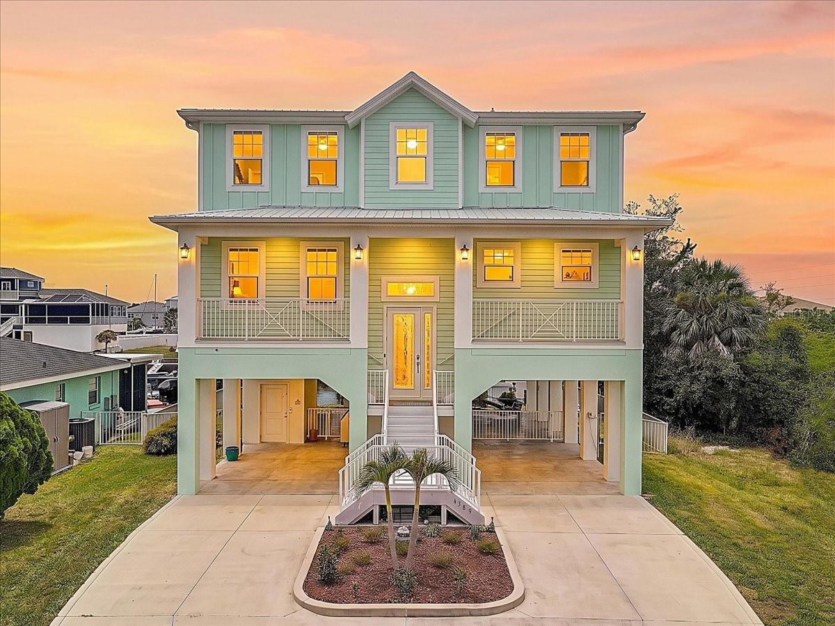 Welcome to 4389 5th Isle Dr, where every day feels like a waterfront vacation. Built in 2022, this exceptional coastal retreat offers deep-water canal frontage with direst Gulf access, making it easy to spend your days fishing, boating, island hopping, or enjoying waterfront dining just minutes from home.
Designed with both luxury and durability in mind, this all-concrete block residence features impact-resistant windows and doors, a private elevator, premium appliances, and high-end finishes throughout. Outside, a brand-new dock and 10,000 lb boat lift provide the perfect launch point for your next adventure on the water.
Relax on your outdoor living spaces while dolphins, rays, and native coastal wildlife pass by, or unwind with breathtaking sunset skies and gentle Gulf breezes. Whether you're seeking a full-time residence, seasonal escape, or the ultimate boating lifestyle, this stunning Hernando Beach home delivers a rare opportunity to live where others vacation.
