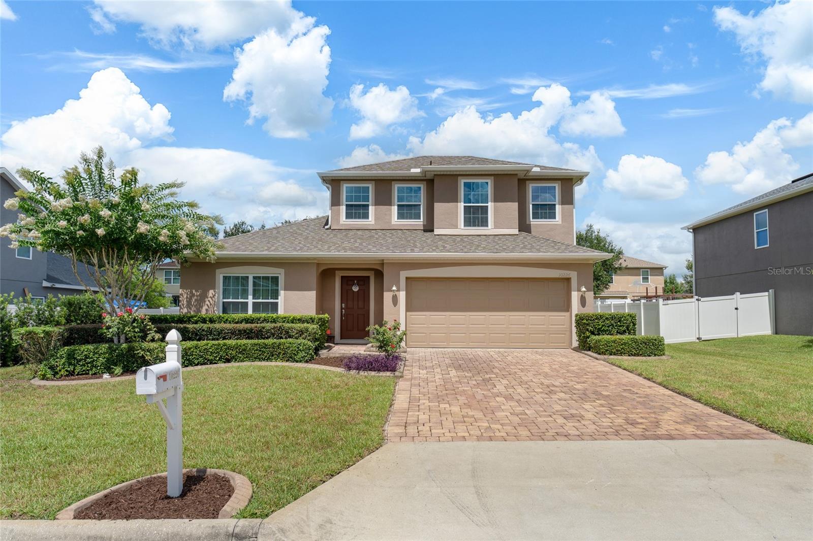 Tucked behind the gates of Barrington Estates, one of Clermont’s most established and well kept communities, this 4-bedroom, 3 bath home offers something rare in today’s market: a thoughtfully designed floor plan that actually fits the way modern families live. Three bedrooms and two full baths sit on the main floor for easy, single level living, while a private upstairs master suite with its own full bathroom and living room creates a true second living space, ideal as an in-law suite, multi-generational retreat, college age suite, or income generating guest quarters. Two complete living zones under one roof means privacy when you need it and togetherness when you want it.

The home has been meticulously maintained and shows immaculate from the moment you walk in, move-in ready with none of the deferred maintenance surprises that come with most resales. The kitchen is built for people who actually cook: a brand new double oven for holiday meals and weeknight dinners running at the same time, 42 inch upper cabinets that deliver real storage and a high end built in look, and a 16 gauge stainless steel single bowl farmhouse sink deep enough to handle sheet pans, stockpots, and cleanup without splashing.

Comfort and safety were designed into every detail. Every interior corner is rounded  a feature originally chosen because the home hosted both an infant and an elderly family member  making it one of the safest layouts you’ll find for young children, aging parents, or anyone who values peace of mind. Gentlemen’s height vanities in the bathrooms mean no more hunching over the sink each morning. Rich hardwood flooring warms the family room, and durable, easy clean vinyl runs through the master bedroom  practical surfaces that still look beautiful.

Step outside and the lifestyle continues. Thermostatically controlled solar panels heat the pool automatically, extending your swim season for most of the year while keeping utility costs down  luxury swim comfort without the luxury energy bill. And at just $184 quarterly, the HOA keeps the community looking sharp and protects your investment without nickel-and-diming you each month.

Location is the quiet superpower of this home. Barrington Estates is perched in the rolling hills of Clermont  “the Gem of the Hills”  just minutes from a downtown that is in the middle of a true renaissance. The new Lumberyard District is bringing 392 residences, restaurants, retail, a rooftop bar overlooking Lake Minneola, and a 55,000 sq ft open air entertainment venue called The Sawmill. The Meet Us in the Middle Plaza is adding a lakefront amphitheater and a brand new 8th Street Pier with 28 boat slips. Add in Waterfront Park, the South Lake Trail, Lakeridge Winery, weekend farmers’ markets, and a growing restaurant scene, and you’re buying into a town whose best chapter is being written right now. Quick connections to Highway 50, US-27, and the Florida Turnpike put Orlando, the theme parks, MCO, and the beaches all within easy reach.

This is the home you buy when you want privacy, flexibility, safety, and a front-row seat to Clermont’s transformation; all at a price the rest of Central Florida can’t match.
