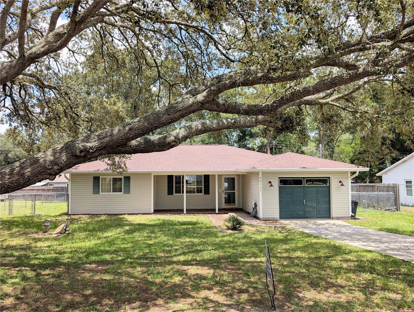 Location, Location, Location Move and ready 3-bedroom, 2-bath, Split bedroom plan. In Rainbows end and a couple blocks from the golf course, walk to Rainbow Springs State Park. Enjoy a day on the river. New roof in 2024, On almost a quarter acre fenced in with storage shed. room for a pool. screened-in back porch. Large one car garage. Kitchen with a pantry, master bedroom with a large walk-in closet. The other two bedrooms both have walk-in closets also. Make this your dream home, vacation home or a great vacation rental. Fenced in yard room for your boat and toys. Great location close to shopping, Rainbow River and restaurants. Bring you rocking chairs for the front porch and relax your on Dunnellon time.