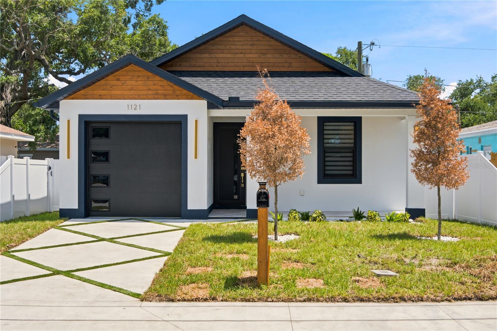 Brand-New Construction in the Heart of Clearwater! Welcome to 1121 Engman St, a beautifully designed new construction home offering modern style, quality craftsmanship, and low-maintenance living in an established and growing neighborhood. This thoughtfully planned residence features an open-concept layout filled with natural light, creating a seamless flow between the living, dining, and kitchen areas—perfect for both everyday living and entertaining.

This 3-bedroom, 2-bathroom home with 1,787 sq ft of living area and a 1-car garage showcases spacious proportions and a functional layout designed for comfort and privacy. The chef-inspired kitchen features contemporary cabinetry, sleek countertops, and stainless-steel appliances, blending style and practicality for everyday use.

The generous bedrooms offer comfortable retreats, while the bathrooms feature modern finishes and clean, timeless design. Built with today’s standards in mind, this home offers energy-efficient systems, durable construction, and quality materials throughout for long-term peace of mind.

Enjoy a private backyard space ideal for outdoor relaxation, gatherings, or future customization. Conveniently located just minutes from downtown Clearwater, world-famous Clearwater Beach, shopping, dining, schools, and major roadways, this home delivers the perfect blend of lifestyle and accessibility.

Move-in ready new construction—don’t miss the opportunity to own a modern 3/2 home with a 1-car garage in one of Clearwater’s most up-and-coming areas!