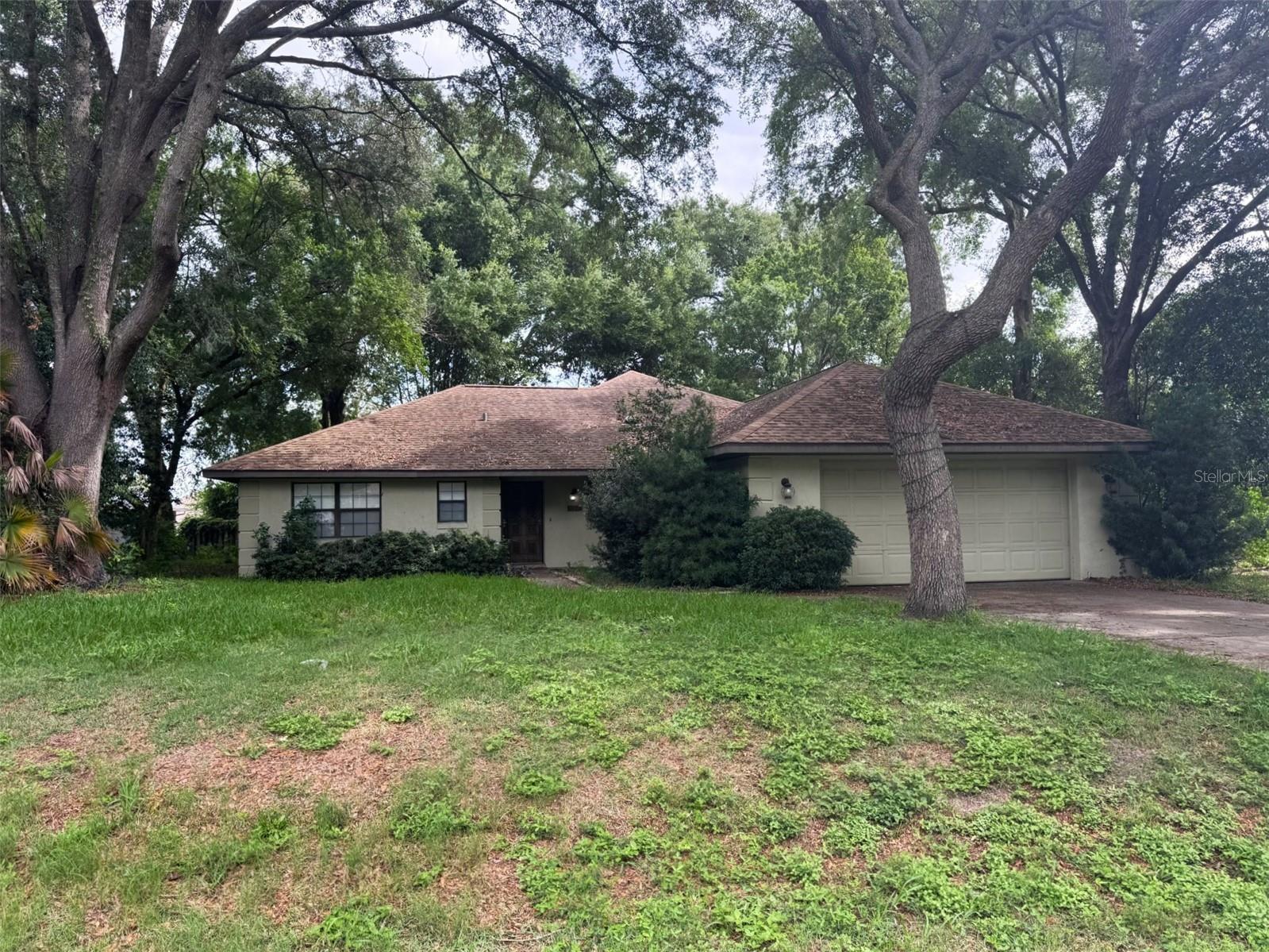 Short Sale. Nestled under mature oak trees on a cul-de-sac street, this charming 3BR/2BA/2GA home features open floor plan, no carpet & private backyard.. 2022 HVAC/H2O HEATER & 2015 ROOF.. Welcoming foyer leads to large great room with sliders to back screened porch, huge kitchen with lots of cabinets & counter space, primary suite with walk-in closet & dual sink vanity in the bathroom, 2 spare bedrooms, guest bathroom with tiled tub/shower, & inside laundry room.. Great SW Ocala convenience in the sought-after neighborhood of Majestic Oaks close to schools, shopping, hospitals & more.. SHORT SALE REQUIRES LENDER APPROVAL! GREAT OPPORTUNITY!