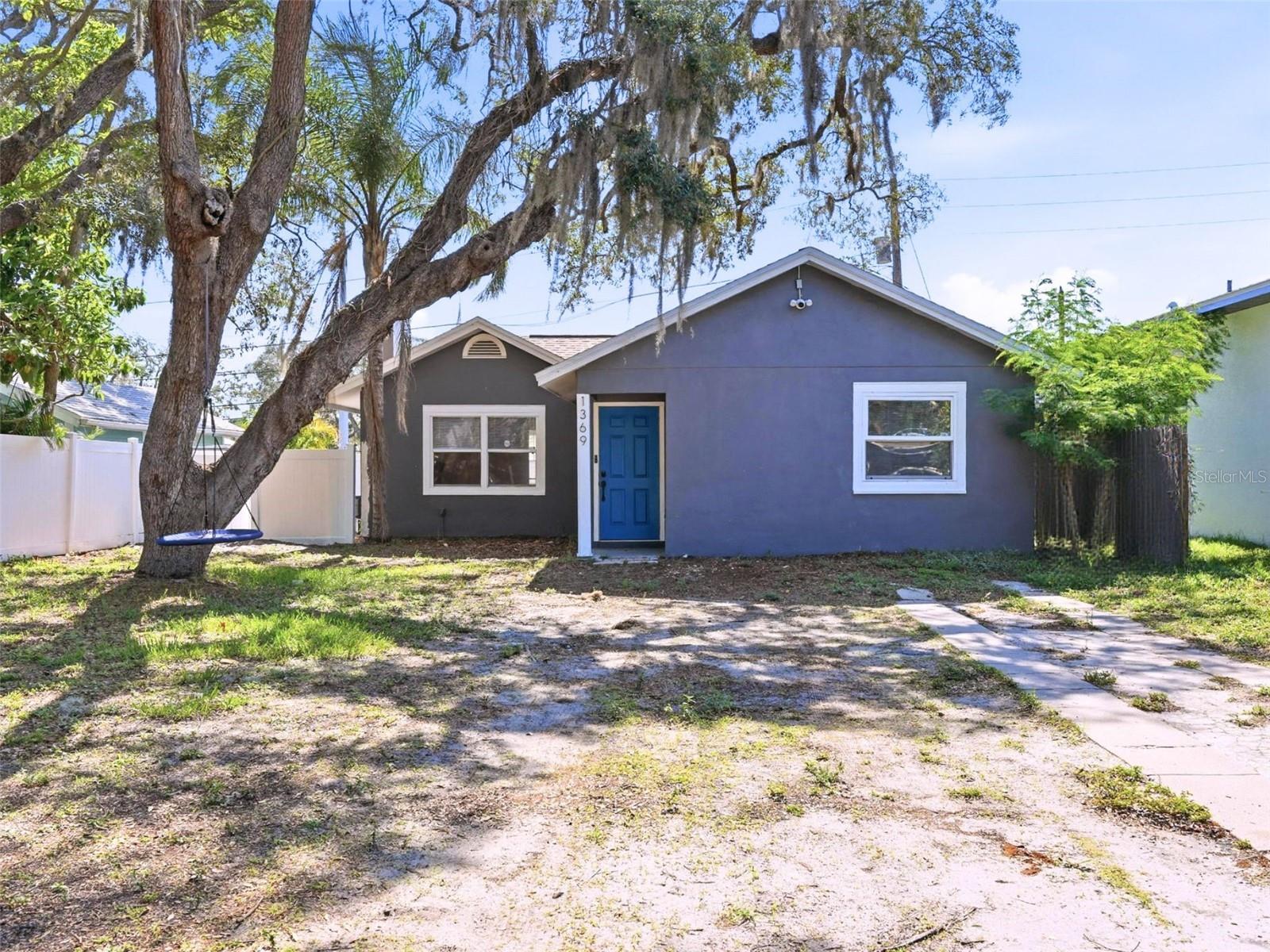 Welcome to this beautifully renovated 3-bedroom, 2-bathroom block home that perfectly combines modern updates with everyday comfort. Major system updates include a 2020 roof, 2021 HVAC system, and 2021 water heater. Thoughtfully upgraded throughout, this move-in ready residence features wood-look luxury vinyl plank flooring installed in 2024, fresh interior and exterior paint completed in 2023, and a fully re-piped plumbing system completed in June 2023 for added peace of mind. The updated kitchen is designed to impress with quartz countertops, a stylish backsplash, floating shelves, and newer stainless steel appliances installed in 2023. A dedicated dining area adjacent to the kitchen creates the perfect space for everyday meals and entertaining. The inviting living room serves as the heart of the home, showcasing a cozy fireplace framed by custom built-in shelving and complemented by new ceiling fans throughout. The primary suite offers a private retreat with a fully renovated en-suite bathroom completed in 2023. Two additional bedrooms and a second full bathroom provide flexibility for family, guests, or a home office. Step outside to enjoy the fenced backyard featuring a storage shed and plenty of space for outdoor activities. The oversized front yard offers exceptional versatility with room for RV parking, boats, trailers, and more. Additional features include a Ring security system with cameras and Ring doorbell that convey with the property. With no HOA, no CDD fees, and no deed restrictions, you'll enjoy the freedom to make this property your own. Conveniently located near shopping, dining, parks, golf courses, and everyday amenities, this home is also less than 15 minutes from the world-famous Clearwater Beach, making it easy to enjoy the best of the Florida lifestyle. Schedule your showing today!