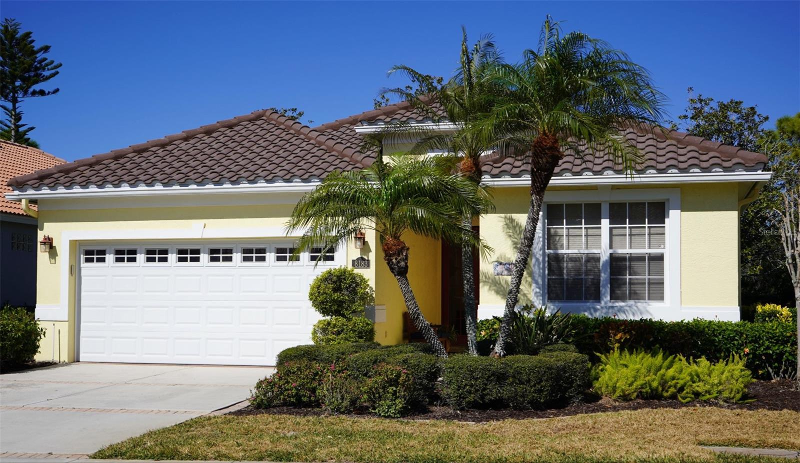 Reduced $30,000.00. NEW TILE ROOF February, 2026! New a/c in July 2025, washer and dryer 3 yrs old. The 2 car garage is outfitted in 2022 with hurricane-rated door. The Somerset community within Turtle Rock is a maintenance free community which includes painting the exterior every 8-10 years (last painted 2023) and roof cleaning every 3-4 years. The master suite offers a peaceful retreat with a 10'x10' extended sitting area ideal as a reading nook or home office. There is new vinyl wood flooring in both the master suite and bedroom #2. Turtle Rock residents enjoy access to outstanding amenities including a heated community pool, tennis courts, clubhouse, playground, and scenic walking trails. Ideally located in Palmer Ranch, you're just minutes from Siesta Key Beach, Downtown Sarasota, Venice, and the Legacy Trail. Current loan of 2.75% is assumable -Loan qualifications apply.