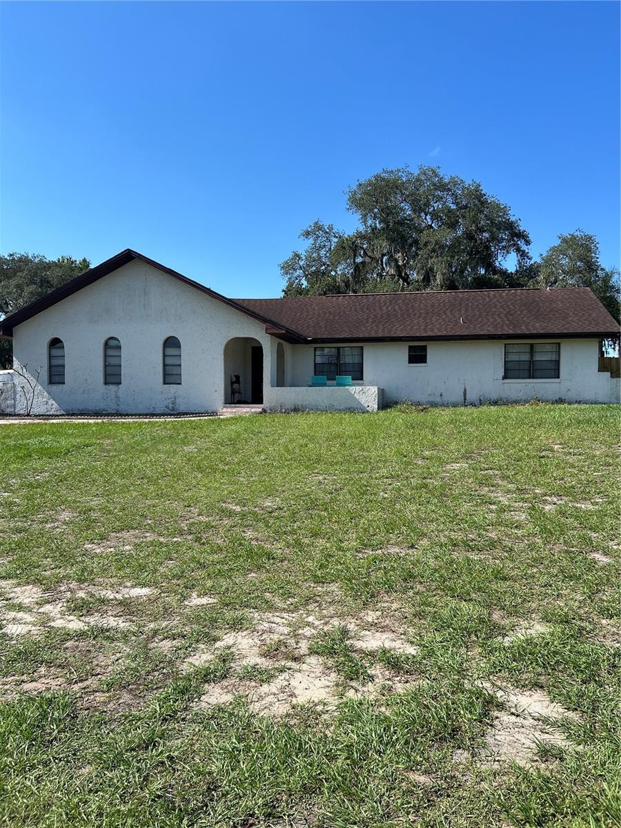 Situated on a generous half-acre lot, this well constructed 2-bedroom, 2 bath home offers endless potential. With a touch of TLC, it's ready to become your dream forever home or a highly lucrative investment property. A POA is offered and is optional for use of the community boat ramp, clubhouse and tennis courts.
