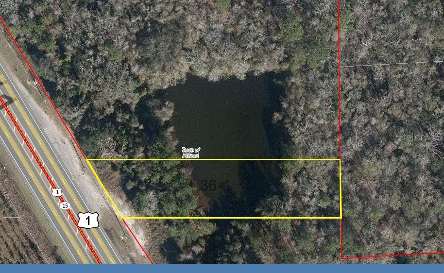 1 of 3 Wooded parcels available for sale. This parcel has .94 acres with a Pond,. All 3 parcels front to US1. Currently zoned C-1. The 3
parcels being sold together total 19+ acres. Former site of Bud's Restaurant. Currently Zoned C-1, location is adjacent to other commercial, office, industrial and multi family parcels so there are many potential uses. See private remarks for PID for the individual parcels being sold.