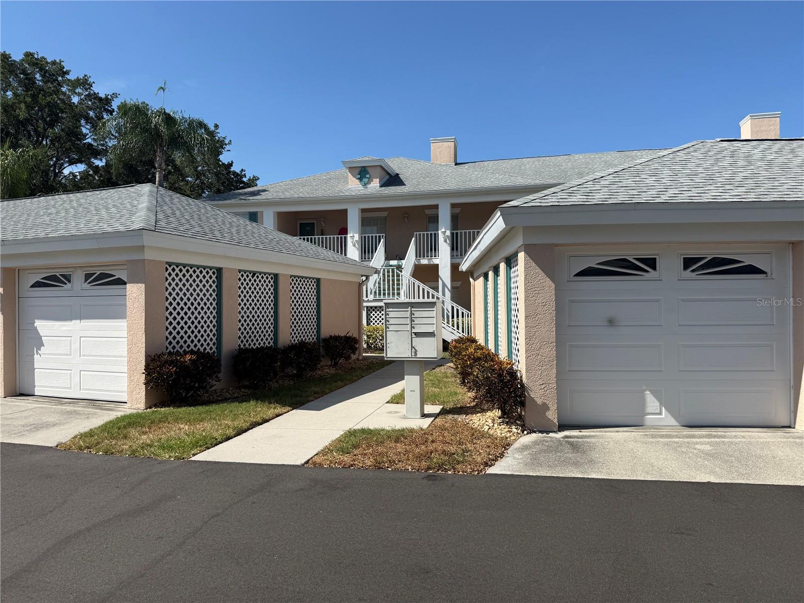 Enjoy this 2BR/2BA second-floor condo with peaceful lake views and desirable southern exposure. Priced for immediate sale, this home offers an excellent opportunity to update and personalize to your taste! Ideal as a year-round residence or seasonal getaway. Relax on the lanai while enjoying Florida's sunshine. Peridia Golf & Country Club amenities include an 18-hole executive golf course, tennis courts, pickleball courts, a community pool, dining, and a variety of social and recreational activities. Fairway Trace residents also have access to a community pool reserved exclusively for Fairway Trace residents. Club offerings may include live music, member events, bowling league, book club, Mahjong, water aerobics, and other organized activities. There is a $4,000 One-Time Capital Reserve contribution, a $600 Annual food/beverage Minimum, a $938 Quarterly Master Association Fee, and a $1,465 Quarterly Fairway Trace Association fee.