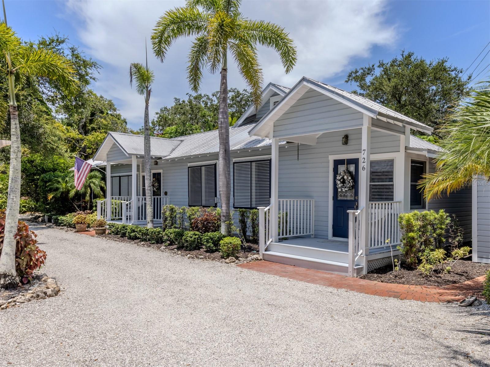 The historic Eagle Point Club in Venice is an exclusive community located within the privacy of mature foliage to the east with Roberts Bay and the Intracoastal Waterway on all other sides. The only one of its kind, it was the creation circa 1910 by Bertha Palmer, famed figure in the early development of Sarasota County Gulf, Bay and waterfront lands. This neighborhood is a hidden gem, still mostly unknown and unseen by the crowds. The focus now is on the pristine residence at 726 Eagle Point Dr. on 1/3 of an acre, the 1920'2-built home is ready for new owners to fall in love with it. Updates have been thoughtfully done including the kitchen and baths that are designed to seamlessly continue the historic look and feel of the community. High ceilings above, original heart-of-pine flooring below, shaded porches on 3 sides, with updates in recent times. A perfectly-sized pool, heated and caged, creates outdoor living area of approx. 42x63. The custom designed free-standing 2+car garage and storage.
Is as handsome as it is functional.  Consisting of 24 acres of just 50 homes, 10 are original structures listed on the National Register of Historic 
Places, the history is rich! A one-of-a kind owner amenity is the updated original clubhouse with deep porches, working fireplaces, library and full kitchen.  It also includes guest bedrooms on the 2nd floor which, like the vintage 3-bedroom guest house next door, may be reserved exclusively for guests of homeowners. For those seeking a highly desired and unique Florida home, be sure to make an appointment to view cherished property.