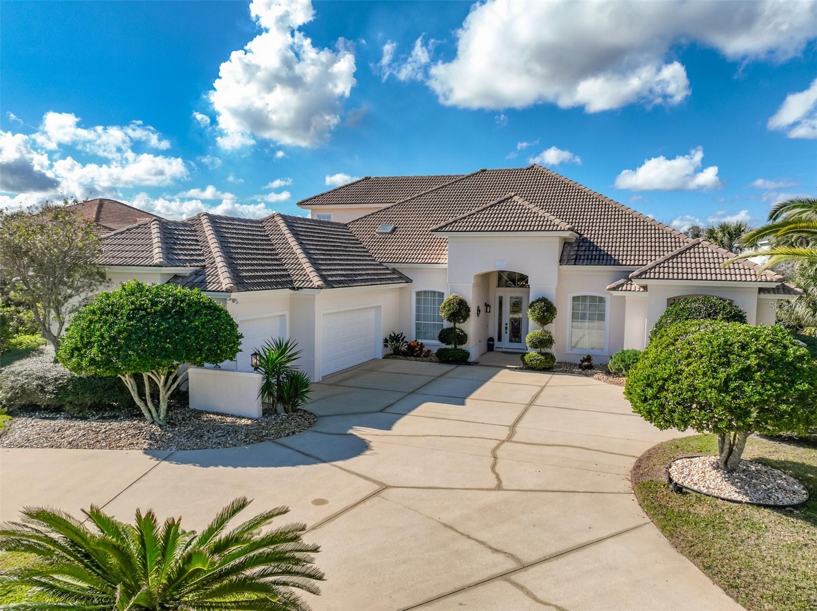 Welcome to Island Estates in Hammock Dunes. Pull you boat up to your DOCK on the Intracoastal and step into this Machin POOL home (one of Palm Coast’s premier builders) with many updates. The current owner has made the following IMPROVEMENTS creating an open concept perfect for entertaining family and friends. 

 COMPLETE REMODEL OF KITCHEN-Removed wall, reconfigured kitchen, cabinets, appliances, wine cooler; 

NEW CARPET FIRST FLOOR BEDROOMS AND OFFICE; 

PRIMARY BATH–New cabinets, light fixtures, glass shower enclosure; 

POOL RESURFACE; 

POOL ENCLOSURE PAINTED AND SCREEN REPLACED; 

POOL DECK PAINTED; 

POOL PUMP AND HEATER; 

OUTDOOR KITCHEN; 

BOAT DOCK REFURBISHED AND LIFT UPDATED, WATER AND ELECTRIC ADDED; 

PAINTED INTERIOR AND EXTERIOR; 

NEW WASHER AND DRYER; 

REPLACED FANS AND LIGHT FIXTURES; 

REPLACED UPSTAIRS HVAC; 

NEW WATER HEATER WITH RE-CIRCULATOR; 

3 BEDROOMS, OFFICE, 3 BATHS ON MAIN LEVEL; 

SECOND LEVEL HAS BEDROOM, BATH, KITCHENETTE AND FAMILY ROOM WITH LARGE SUN DECK WITH VIEWS OF ICW. 

This waterfront home is in the gated community of Island Estates which consists of 168 homes on large 1+ acre lots and has private gated beach access.  It is in the area locals refer to as “The Hammock” and is part of Hammock Dunes. Hammock Dunes Club has memberships available but are not required.  In addition to boating, with a membership to Hammock Dunes Club, one can enjoy amenities found in 5-star resorts. Located on the ocean, the club has 2 golf courses, restaurants, pool and splash pad, tennis, croquet, pickle ball, huge fitness center and social events that will appeal to everyone. Palm Coast is the best kept secret in Florida. Miles of beautiful beaches, over 125 miles of bike paths, beautiful parks along Intracoastal Waterway, a thriving art & theater community, home of famous artists, golf courses for every day, fishing, boating, wind sailing, surfing, canoeing are just a few of the things to do. Orlando and Disney World are close for a day outing and Jacksonville with all the shopping one could desire & the famous Mayo Clinic is one hour. NASCAR & ST. Augustine are within a thirty-minute drive.