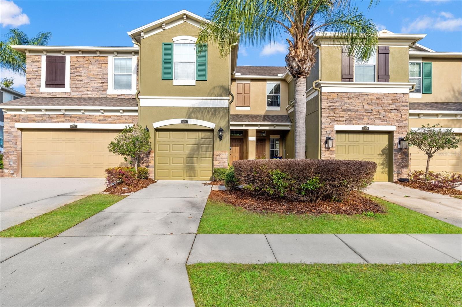 One or more photo(s) has been virtually staged. This gated townhome in the heart of Tampa offers easy, low-maintenance living with peaceful water views and a bright, open interior. As you step inside, you'll be greeted by a gorgeous kitchen featuring granite countertops, beautiful cabinetry, and a full suite of stainless steel appliances. The open-concept layout seamlessly connects the kitchen to the living and dining areas, creating a warm and inviting atmosphere ideal for entertaining or relaxing while taking in the serene views of the pond and charming fountain. Beyond the kitchen, this easy-to-maintain home boasts recently replaced air conditioning and water heater systems, ensuring your comfort and peace of mind. The sizable bedrooms provide ample space for rest and relaxation, while the attached garage offers secure and convenient parking. The true gem of this property, however, lies in its exceptional location. Situated in the desirable area of Westchase, , this townhouse puts you in close proximity to a wealth of shopping, dining, entertainment options and just minutes from major highways. Spend your weekends exploring the vibrant downtown Tampa area, or take advantage of the nearby parks and recreational facilities for an active lifestyle.  This home offers a rare combination of location, convenience, and serene water views in one of Tampa’s most desirable communities. This is an opportunity not to be missed. Schedule your private showing today!