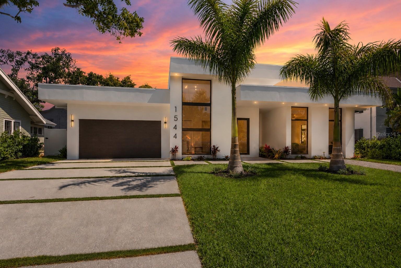One or more photo(s) has been virtually staged. Luxury New Construction in the Heart of Downtown Bradenton!
Completed in 2026, this custom-built residence delivers a striking blend of modern architecture, premium finishes, and effortless indoor–outdoor living. Designed to impress at every turn, floor-to-ceiling hurricane-impact glass fill the home with natural light while providing the strength and protection essential for Florida living.
Featuring 4 bedrooms and 3.5 bathrooms, this home offers a thoughtfully designed layout that balances sophistication with everyday comfort. The primary suite is a true spa-like retreat, complete with a luxurious bathroom designed for relaxation, creating a private sanctuary within the home.
At the center of the home, a showpiece kitchen anchors the main living space—featuring a dramatic waterfall quartz island and countertops, designer Terraneo stucco backsplash and hood, custom cabinetry, a sleek designed wet bar, and an oversized butler’s pantry for seamless entertaining and additional prep space. Every detail has been thoughtfully curated to reflect both form and function, tailored to a discerning lifestyle.
Step outside to your private resort-style retreat. A custom shellcrete pool deck surrounds a heated, modern pool and spa, complemented by a fully equipped outdoor kitchen, dedicated lounge area, and inviting firepit—creating the perfect setting for evening gatherings under the Florida sky.
Additional highlights include a custom shellcrete driveway and an upgraded epoxy flake garage floor, offering both durability and a refined aesthetic.
Perfectly positioned in the heart of downtown Bradenton, this home places you just moments from award-winning restaurants, vibrant entertainment, and the scenic Riverwalk. For boating enthusiasts, nearby marina access allows you to conveniently keep your boat ready for exploring the Manatee River and the open waters of the Gulf.
This is more than a home—it is a statement of modern coastal living.
A true showstopper that won’t last. Schedule your private showing today.