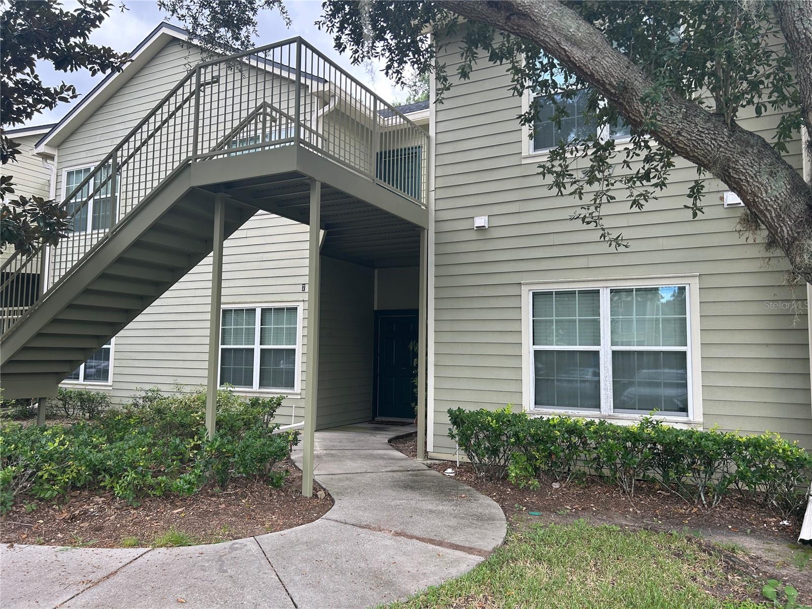 Nestled within the desirable Ashley Court community, this well-maintained 2-bedroom, 2-bath condominium offers the perfect combination of comfort, privacy, and investment potential. Positioned on the ground floor, the unit enjoys peaceful conservation views from a spacious screened lanai, creating a private outdoor retreat rarely found in condominium living. Inside, you'll find an open and inviting floor plan featuring tile flooring throughout the main living areas, crown molding, neutral designer colors, and abundant natural light. The kitchen overlooks the living and dining spaces and offers granite countertops, ample cabinetry, and a functional breakfast bar ideal for everyday living and entertaining. The oversized primary suite provides plenty of room for a king-sized bedroom set and includes a walk-in closet and private bath with granite vanity and tile-surround tub/shower. A generously sized secondary bedroom and full guest bath provides flexibility for guests, family members, or a home office. Ashley Court is known for its attractive grounds, mature landscaping, resort-style pool, heated spa, and relaxing atmosphere. The community is conveniently located near shopping, dining, major highways, downtown Orlando, and area attractions, making it an excellent choice for both residents and investors alike. For investors, this opportunity is even more attractive with a long-term tenant already in place, providing immediate rental income from day one. The community's HOA dues have remained moderate and relatively consistent over the years, helping to create predictable ownership costs and strong long-term investment potential.
