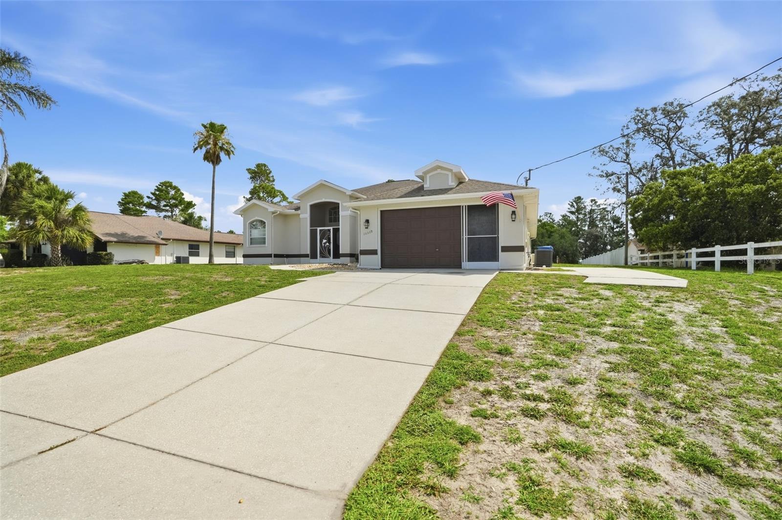 13339 Drayton Drive, Spring Hill, FL 34609
Welcome to this beautifully remodeled pool home situated on a rare nearly three-quarter-acre homesite with NO HOA, offering the freedom, privacy, and space that today's homeowners desire. Built in 2000 and thoughtfully updated throughout, this move-in-ready residence combines modern finishes, spacious living, and exceptional outdoor enjoyment.  Some photos have been virtually staged for lifestyle living.  This home is completely vacant.

From the moment you arrive, you'll appreciate the fresh interior and exterior paint, newer roof, new AC system, and newer hot water heater, providing both style and peace of mind. Inside, soaring ceilings and an open-concept design create a bright, airy atmosphere, while attractive tile flooring throughout the main living areas and bathrooms offers both elegance and easy maintenance.

At the heart of the home is a stunning, fully updated kitchen featuring 42-inch shaker cabinets, beautiful quartz countertops, all-new appliances, and abundant workspace. With generous counter seating, this kitchen is the perfect gathering place for family and friends, offering an exceptional space for cooking, entertaining, and creating lasting memories.

The home offers both a formal dining room for special occasions and a charming breakfast nook overlooking the pool and backyard. Designed with privacy in mind, the spacious primary suite serves as a relaxing retreat with pool views, a luxurious en-suite bath featuring a garden tub, separate shower, and ample closet space.

The desirable split-bedroom floor plan places two additional bedrooms on the opposite side of the home, sharing a well-appointed guest bath with convenient access to the pool area—perfect for family living and entertaining guests.

Adding to the home's functionality is a large indoor laundry room, providing ample space for storage, organization, and everyday convenience.

One of this home's most impressive features is its seamless connection to the outdoors. Most rooms overlook the large recently refinished in-ground pool, creating a bright and inviting atmosphere throughout the home. Surrounded by an expansive pool deck, there is plenty of room for outdoor dining, lounging, entertaining, and enjoying Florida's year-round sunshine. The outdoor living space is further enhanced by all new pool equipment, providing years of enjoyment and worry-free ownership.

The oversized backyard .73 acres, offers a rare level of privacy and space not often found in Spring Hill, with plenty of room for outdoor activities, gardening, pets, RVs, boats, or future additions—all without the restrictions of an HOA.  Home also has a sprinkler well and RV electric hook up.

Conveniently located near shopping, dining, medical facilities, parks, and schools, and just minutes from the Suncoast Parkway for an easy commute to Tampa and surrounding areas, this exceptional property delivers the perfect blend of modern updates, comfortable living, and resort-style outdoor enjoyment.

Beautifully updated and situated on a rare oversized lot with NO HOA, this is the Florida lifestyle you've been waiting for. From the stunning remodeled interior and chef-inspired kitchen to the large refinished pool, expansive pool deck, and private backyard, 13339 Drayton Drive is truly move-in ready and designed for both everyday living and entertaining. Schedule your private showing today.