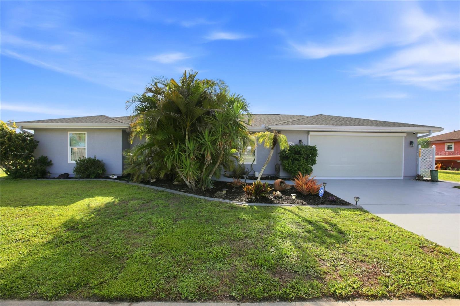 Welcome to 5600 Lingle Street — a beautifully updated 3 bedroom, 2 bath, 2 car garage offering comfort, charm, and Florida-style living at its finest. Designed with a warm and inviting feel, this well-maintained residence features bright living spaces, tasteful finishes, and a functional layout perfect for both relaxing and entertaining.

Step outside and enjoy your own private outdoor oasis featuring a 6-person hot tub installed in 2023 — the perfect place to unwind and enjoy peaceful Florida evenings. Major updates provide added peace of mind, including a new roof (2023), new heater (2023), and AC replaced in 2024. Also with city water and public sewer. 

Enjoy beautiful lake views with opportunities for fishing and canoeing, creating the perfect setting for embracing Florida's outdoor lifestyle. Located near Blue Ridge Lake with access to the Coco Plum Waterway, this home offers a peaceful setting while remaining close to shopping, dining, parks, golf courses, schools, and Gulf Coast beaches. Whether you’re looking for a full-time residence, seasonal escape, or investment opportunity, this move-in-ready gem combines modern updates, comfort, and convenience in one desirable package.