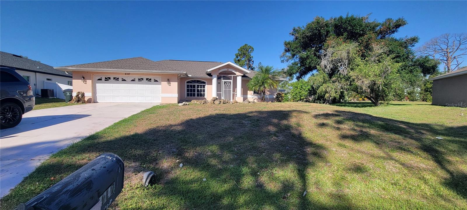 Great big family home in North Port!   Extra large primary suite with huge walk in closet, private bath and split plan design.  There is a family room in addition to the living room, an office/den/library with barn doors...  Bedrooms 2 and 3 have spacious walk in closets and there is a dedicated laundry room.  The lanai is oversized and the appliances are newer and the roof is approximately 2 years old.  If you are looking for lots of living space on a large lot - this one is for you...