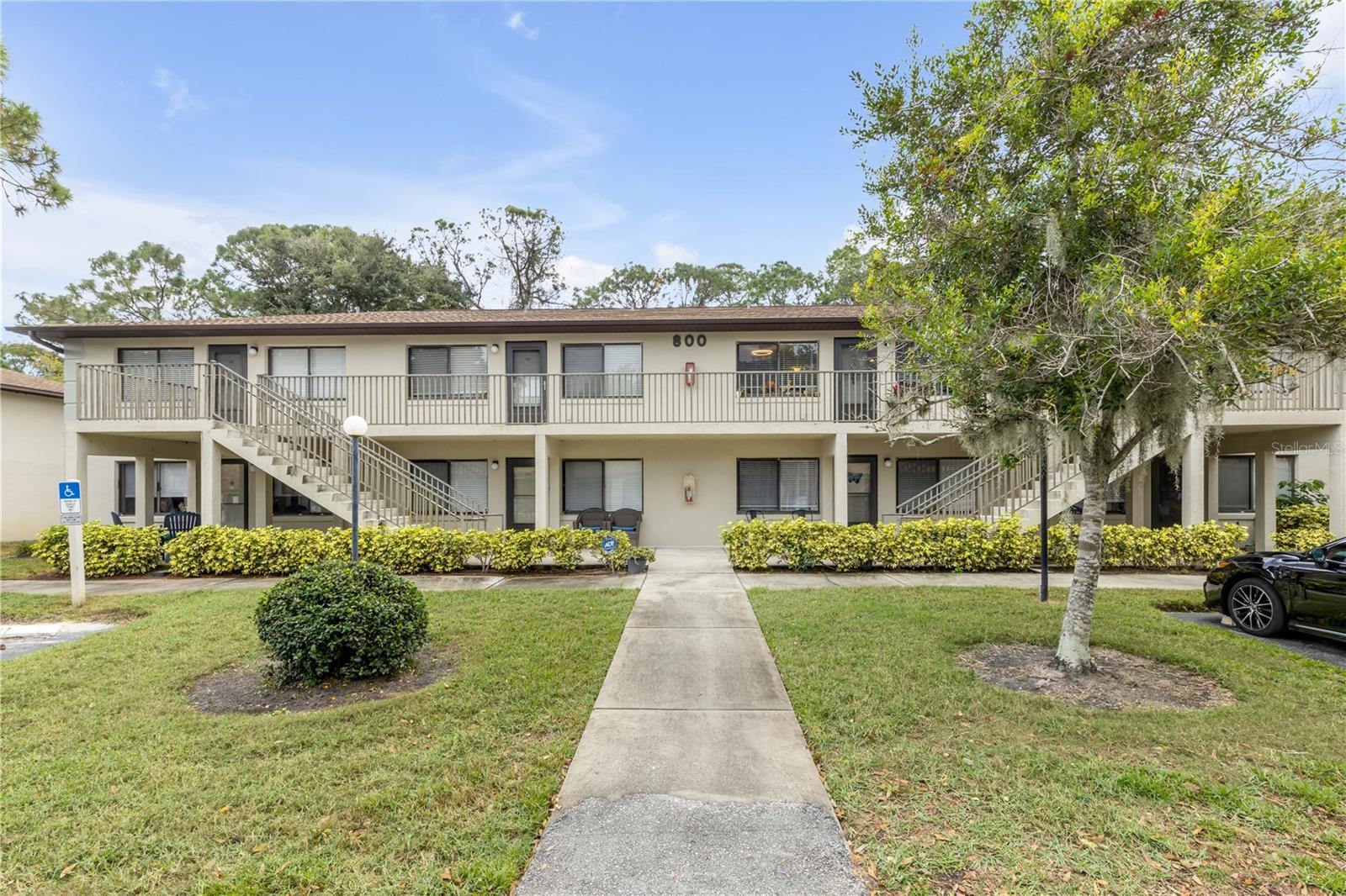 Well-maintained and move-in ready, this updated 2-bedroom, 2-bath second-floor condo offers comfortable, low-maintenance living in a convenient South Daytona location. Recent improvements include a brand-new AC unit, new LVP flooring, fresh interior paint, an updated kitchen backsplash, newer appliances, and a new stackable washer and dryer. The unit also features a covered carport with a private 60 sq. ft. storage room and an additional assigned parking space. Located in a pet-friendly community with amenities including a pool, hot tub, clubhouse, and racquetball court, the HOA fee includes water and flood insurance for added value. Conveniently situated near I-4, I-95, Embry-Riddle Aeronautical University, Daytona State College, Bethune-Cookman University, Publix, USPS, fitness centers, shopping, dining, and entertainment, and just minutes from the area's beautiful beaches. Ideal as a primary residence, seasonal retreat, or investment opportunity.