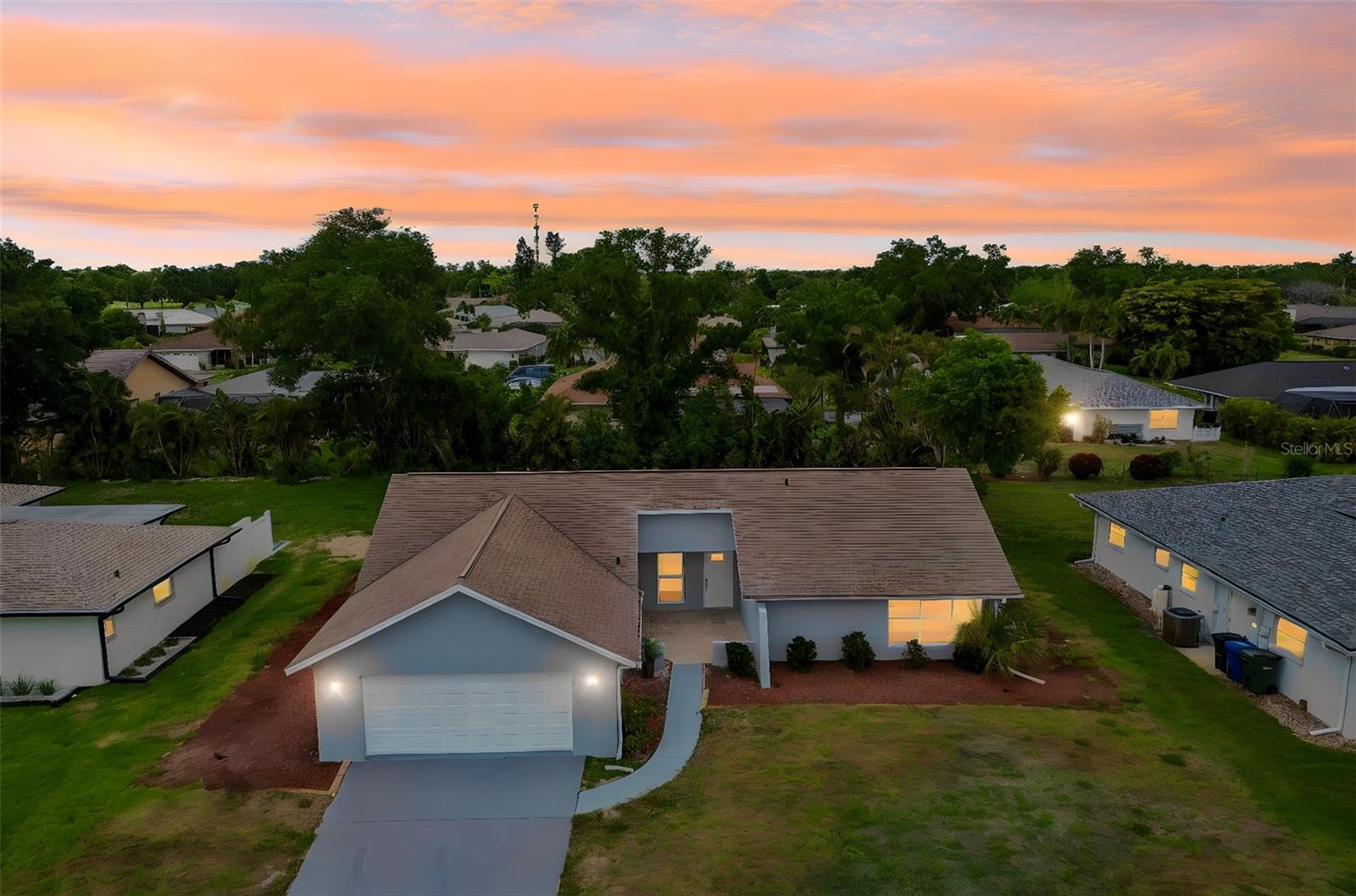 Virtually Staged. OWNER MOTIVATED | NO FLOOD INSURANCE REQUIRED | NO CDD  | LOW HOA. Beautifully renovated 4-BEDROOM, 2-BATH home offering just over 1,800 SQ FT of living space in the VENICE GARDENS SUBDIVISION, tucked in a QUIET RESIDENTIAL NEIGHBORHOOD and LOCATED IN THE HEART OF JACARANDA WEST NEAR PLANTATION GOLF & COUNTRY CLUB. This MOVE-IN READY property features NEW INTERIOR AND EXTERIOR PAINT, BRAND-NEW FLOORING THROUGHOUT, and a completely updated kitchen with a LARGE WATERFALL ISLAND, modern cabinetry, and stylish finishes. Both bathrooms have been FULLY RENOVATED with contemporary design elements. The spacious layout offers comfortable living areas and flexibility for everyday living or entertaining. The community offers CONVENIENT ACCESS TO US-41 and is just a SHORT DRIVE TO VENICE’S FAMED BEACHES, GOLF COURSES, PARKS, SHOPPING, AND DINING. Zoned for A-RATED SARASOTA COUNTY SCHOOLS.
