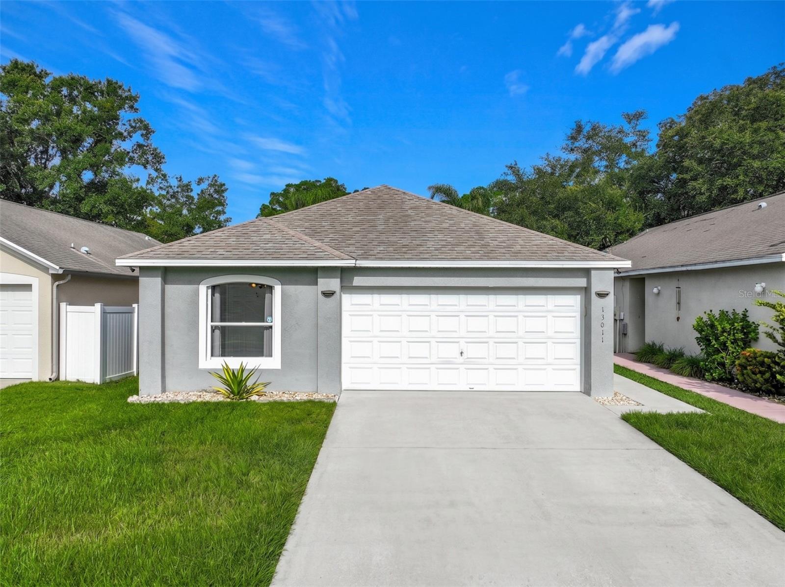Light, Bright & Move-In Ready in East Orlando!

Welcome to 13011 Odyssey Lake Way, Orlando, FL 32826, where comfort, style, and functionality come together in this beautifully maintained 3-bedroom, 2-bathroom home with a 2-car garage.

Step inside and immediately appreciate the light-filled interior, soaring vaulted ceilings reaching up to 11 feet, and an inviting open floor plan that creates a spacious feel throughout. The versatile layout offers a formal dining room that can easily be transformed into an expansive 16' x 23' great room, providing even more space for entertaining, relaxing, or gathering with family and friends.

The thoughtfully designed split-bedroom floor plan provides privacy for the primary suite while keeping the secondary bedrooms comfortably separated. Every bedroom features a ceiling fan for year-round comfort, and new luxury vinyl plank flooring has been installed in Bedroom #3.

The spacious kitchen is designed for both everyday living and entertaining, offering abundant cabinet and countertop space, updated countertops, a newer refrigerator, new light fixtures, a convenient breakfast bar, and plenty of room for a kitchen table. Just beyond the kitchen, step outside to your 10' x 19' covered porch with upgraded flooring, creating the perfect spot to enjoy your morning coffee or unwind in the evening.

The primary suite features an updated shower, adding a fresh, modern touch to your private retreat.  The walk in closet measures 6'x5'. 

Additional highlights include:

All appliances and window treatments convey
Roof approximately 10 years old (October)
Air conditioning system only 3 years old
Pull-down attic stairs in the garage with floored storage space
Two-car garage with additional overhead storage

This well-maintained home offers the perfect combination of open living spaces, thoughtful updates, and practical features—all in a desirable East Orlando location with convenient access to shopping, dining, major highways, the University of Central Florida, and area employers.

Experience the best of affordable living in Lake Pickett Manor where low HOA fees, a dog park, and a basketball court combine for a lifestyle that's as enriching as it is affordable. This property offers suburban living with easy access to urban amenities. Whether you're seeking a cozy haven to unwind after a busy day or a welcoming space to entertain friends and family, this home offers the perfect blend of comfort and convenience.