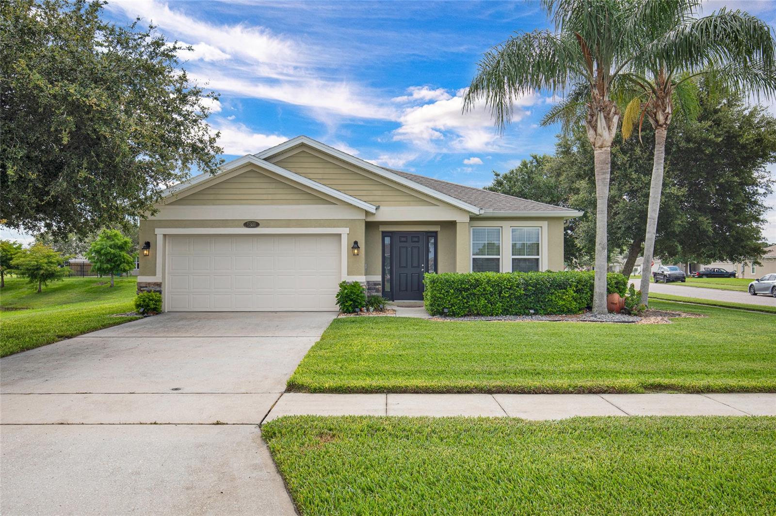 Now available, this beautifully maintained waterfront residence is perfectly positioned on a premium corner lot in one of Port Orange's most desirable communities. Thoughtfully designed for both comfortable everyday living and effortless entertaining, this inviting 3-bedroom, 2-bath home offers approximately 1,665 square feet of well-appointed living space featuring an open-concept floor plan filled with abundant natural light. Step through the welcoming front entry into a bright, sun-filled foyer that flows into a versatile flex space—perfect for a home office, reading nook, media room, or additional sitting area. From there, the home opens into an expansive living room, dining area, and well-equipped kitchen, creating a seamless gathering space ideal for hosting family and friends or simply enjoying daily life. The kitchen is designed with both style and functionality in mind, offering abundant cabinetry, generous counter space, a convenient breakfast bar, and an open view of the main living areas, allowing the chef to remain part of every conversation. The thoughtfully designed split-bedroom floor plan provides exceptional privacy, with the spacious owner's suite serving as a peaceful retreat complete with a large walk-in closet and an en-suite bath. Two additional guest bedrooms and a full bath are privately situated on the opposite side of the home, providing comfortable accommodations for family and visitors alike. Walls of windows bathe the interior in natural light while framing peaceful views of the surrounding landscape. Just beyond, the covered lanai invites you to unwind with your morning coffee, enjoy cool evening breezes overlooking the water, or entertain guests in a tranquil outdoor setting. Additional highlights include an interior laundry room, an attached two-car garage, and outstanding curb appeal enhanced by the oversized waterfront corner homesite. Whether you're searching for a full-time residence, seasonal getaway, or investment opportunity, this exceptional home offers the perfect blend of comfort, functionality, and picturesque waterfront living. Ideally located just minutes from top-rated schools, shopping, restaurants, medical facilities, parks, golf courses, and the beautiful Atlantic beaches, this move-in-ready home provides an outstanding opportunity to experience the very best of the Port Orange lifestyle.