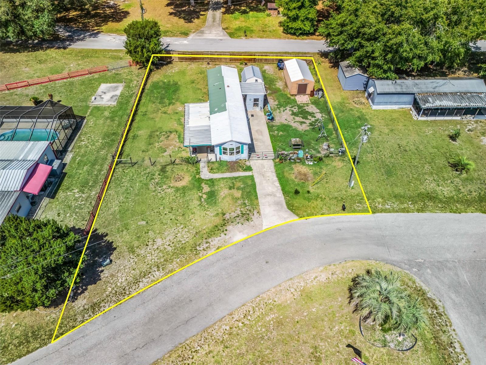 NO LOT RENT - YOU OWN THE LAND - NO HOA -OWNER MOTIVATED, READY TO NEGOTIATE CASH OR CONVENTIONAL LOAN  

Whether you're searching for your first home, a relaxing snowbird retreat, or a smart investment opportunity, this property checks all the boxes. Set on a spacious .26-acre lot with no HOA, you’ll enjoy the flexibility of country living with room to make it your own. This 2-bedroom, 1-bath manufactured home (854 sq ft) offers a comfortable and functional layout, plus a 12x20 enclosed Florida room that adds valuable living space—perfect for a second living area, home office, or seasonal enjoyment. The seller states these key updates have already been completed, including the bathroom and plumbing (2024), windows and water heater (2025), and HVAC new in 2025 and a recently serviced HVAC (2026), providing peace of mind for homeowners and investors alike. Outside, the property continues to impress with fencing on both sides and along the back for added privacy, a 12x20 workshop with electric for hobbies or storage, and an 8x10 metal laundry/storage building with washer and dryer. A new above-ground pool was just installed. The septic system was pumped in 2025, helping minimize immediate maintenance concerns. Conveniently located with easy access to SR 471, SR 50, US 301, and I-75, this home offers a great balance of quiet living and accessibility to medical offices, shopping, farmers' markets, and entertainment. Just a short drive to Tampa, Orlando, The Villages, and Ocala. Whether you're planning to live in it full-time, use it seasonally, or add it to your rental portfolio, this property offers versatility and value.