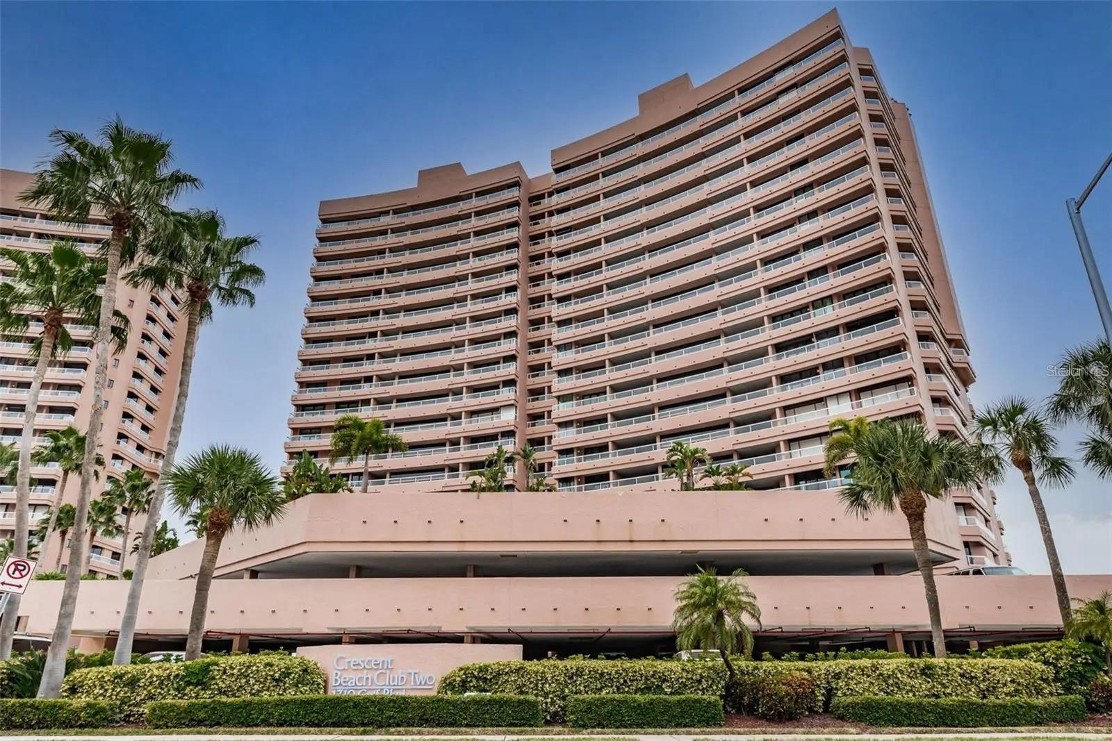 Designed to bring the outdoors in, this two-bedroom, two-and-a-half-bath condo offers a seamless connection to its surrounding coastal landscape. The condominium's spacious living area and generously sized primary suite both feature direct balcony access, showcasing breathtaking beach views and spectacular Gulf of Mexico sunsets. The second bedroom, complete with a private en-suite bath, opens to its own patio with serene east-facing views of the Intracoastal Waterway. A thoughtfully designed split floor plan ensures optimal privacy for both residents and guests. Residents of Crescent Beach Club enjoy an array of exceptional amenities, including a beautifully appointed clubroom with full kitchen, fireplace, and TV lounge, a fully equipped fitness center with showers and lockers, as well as a sauna, steam room, and indoor whirlpool. The beachfront pool is heated with a geothermal system for year-round comfort, and a newly renovated barbecue area features four gas grills-perfect for entertaining. With on-site management, 24-hour security, a new roof (2019), and updated
elevators (2020), the community is meticulously maintained and offers peace of mind. Rentals are permitted with a two-week minimum stay. Ideally located just a short stroll from the Shoppes of Sand Key and with easy trolley access to Pier 60, this residence captures the essence of refined coastal living.