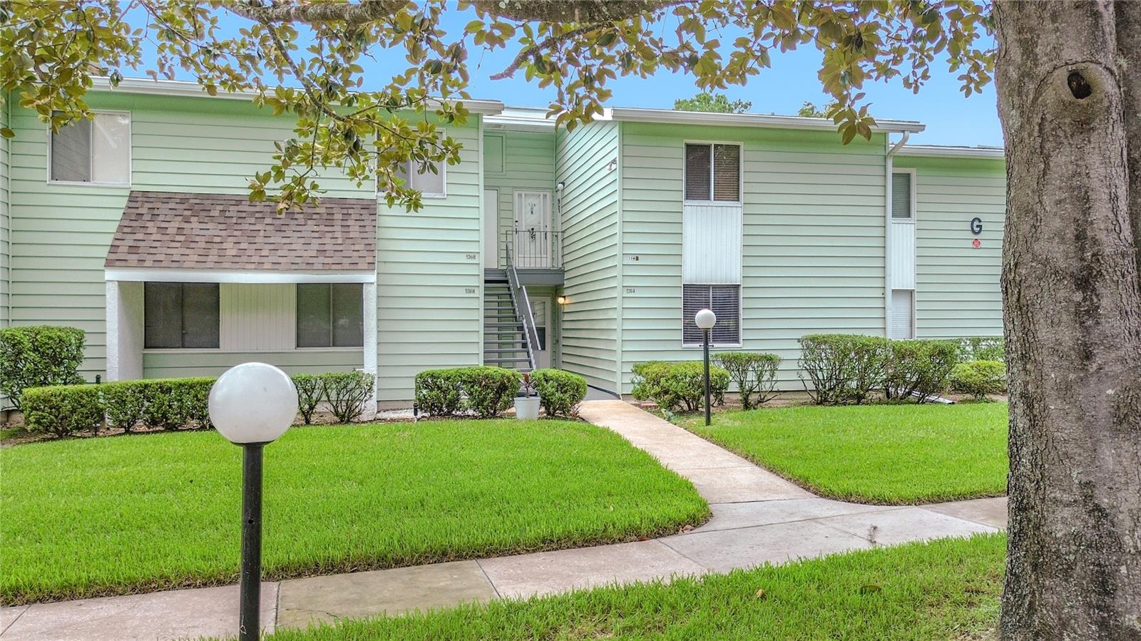 Welcome to easy Florida living in Live Oak Village, a desirable 55+ condominium community in Silver Springs Shores. This beautifully updated 1-bedroom, 1-bathroom residence offers 844 square feet of bright, open living space designed for comfort and simplicity. The updated kitchen features granite countertops, a subway-tile backsplash and new stainless-steel appliances, while flowing seamlessly into the living and dining areas. Step outside to the extended brick-paver patio and enjoy peaceful golf-course views the perfect setting for morning coffee or an evening beverage.

The HOA fee includes basic cable, exterior insurance, trash service, maintenance of the building and common grounds, plus access to the community clubhouse and swimming pool. The Silver Springs Shores Community Center is approximately five minutes away, where residents may obtain an affordable annual membership to enjoy additional amenities, including a heated swimming pool, pickleball, tennis and basketball courts, exercise programs, aqua-cise, yoga, billiards, table tennis, games and community activities.

Conveniently located near shopping, dining, medical services and everyday necessities along Maricamp Road, with easy access to downtown Ocala, Silver Springs State Park, the Appleton Museum of Art and numerous parks, trails and outdoor recreation opportunities. Come enjoy low-maintenance living, wonderful amenities and a beautiful golf-course view!