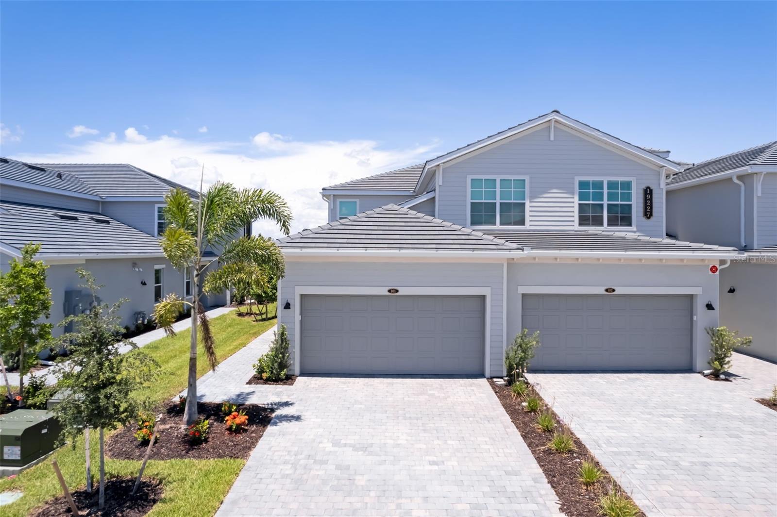 THIS GOLF COACH HOME IS READY FOR YOU NOW!! Own a stunning slice of paradise at our premier golf and resort community, nestled in the award-winning Lakewood Ranch. Discover the pinnacle of golf and resort-style living. Calusa Country Club features two exceptional golf courses and a variety of top-tier amenities in one of Florida's finest locations. This single-story coach home features a modern open design among the dining room, kitchen and living room, with access to the covered outdoor lanai. The owner's suite with a spa-like bathroom is located toward the back of the home, while two secondary bedrooms sit near the entrance. A two-bay garage offers extra storage space. Prices, dimensions and features may vary and are subject to change.