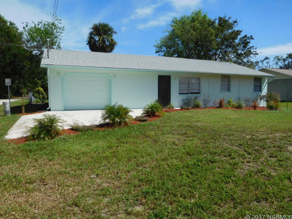 Possible Lease purchase.  KITCHEN is  BEAUTIFUL. NEW CABINETS, New Counter Top, Copper Sink, UPDATED WITH STAINLESS APPLIANCES. NEW WOOD LAMINATE FLOORING. PAINT AND LIGHT FIXTURES. Baths are completely redone with NEW Tile. FENCED YARD WITH 20 X 8 STORAGE CONTAINER. Al;so big gate to allow parking for your boat. Location is close to Mosquito Lagoon , the BEST FISHING the Intracoastal has to offer. Great school, Burns Science Tech  Charter School is just around the corner. Close to Boston Whaler or shoot down  to the Cape. MUST SEE THIS HOME