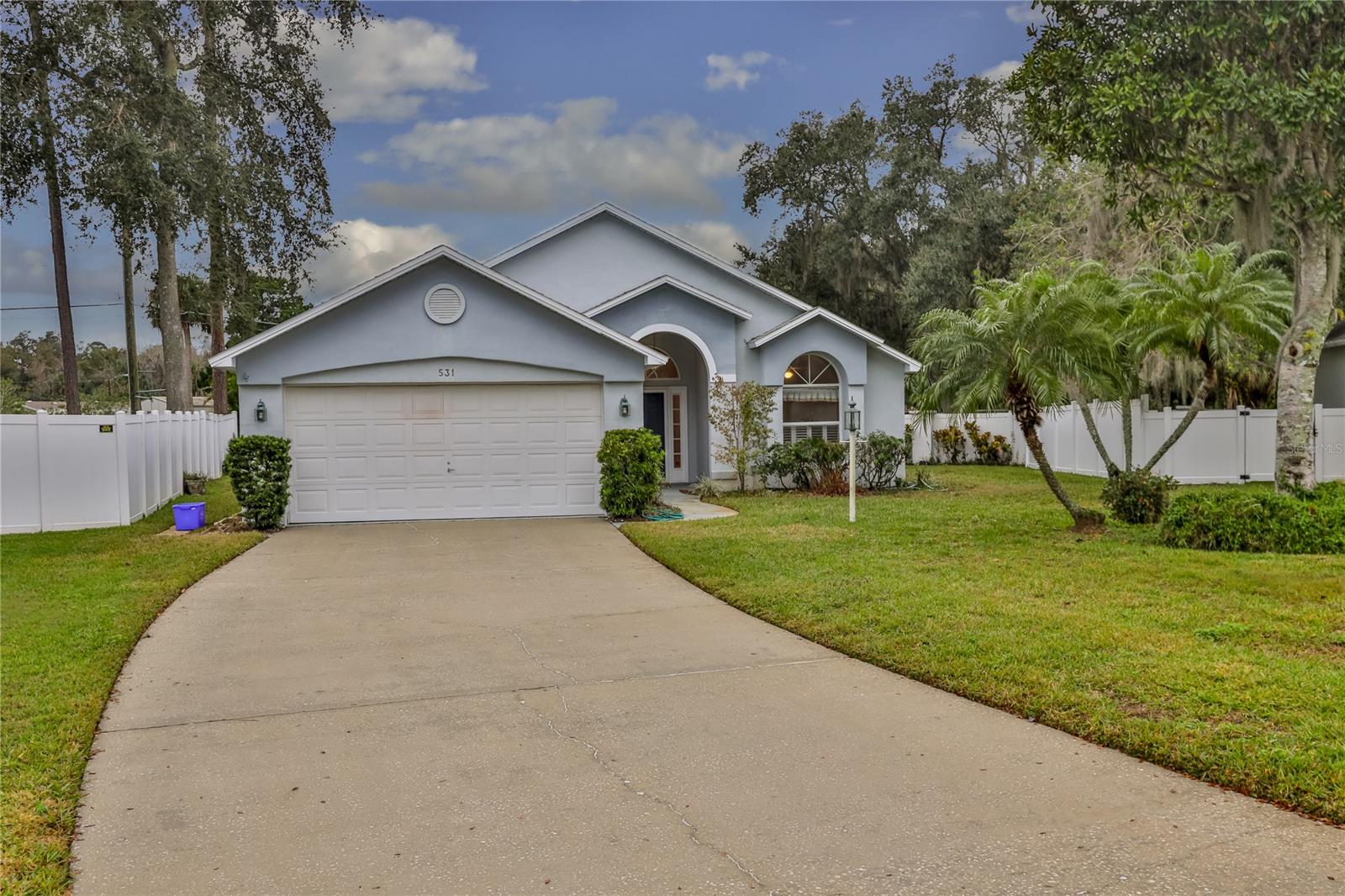 Fantastic Location in New Smyrna Beach.  Centrally located in Century Woods Subdivision is in close proximity to 2 Golf Courses, Canal Street Shopping, and a short drive to the Beach.  Home is located on a Cul de Sac in a quiet neighborhood with Sidewalks. Larger corner lot with a fenced yard, and beautiful mature landscaping surrounds this home.  The homes features a Semi-Open Floor plan.  Enter into a spacious Living Room, Dining Room area with Vaulted Ceilings adjacent to the Kitchen.  Eat in Kitchen and Kitchen Bar that opens up to the Family Room.  Large Florida Room which is an enclosed porch overlooks the backyard. The Master Bedroom overlooks the backyard as well.  Home has Hurricane Shutters and some Built in Hurricane Shutters throughout.  Annual HOA is approx. $370.00 per year which covers Common Areas in Subdivision.  Home shows great and looking for new Owners to make it their own.  All information and dimensions are approximate and should be verified by the Buyer. ;Water: City