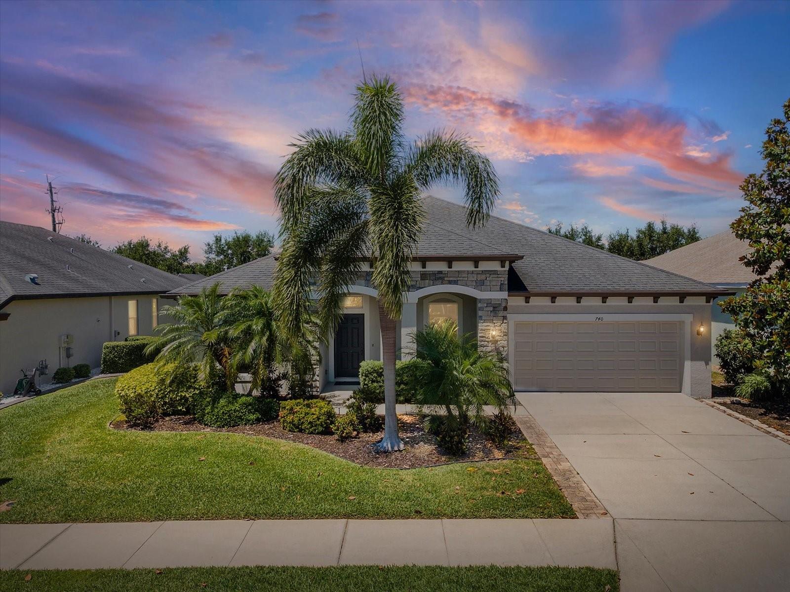 4BR PLUS office/3.5BA home in Greyhawk Landing in Bradenton. In-law suite + 3-car tandem garage. Built 2016, Flood Zone X, low $70/yr HOA.

This 4-bedroom PLUS office, 3.5-bathroom single-family home in Greyhawk Landing in Bradenton offers 2,825 square feet, a one-story layout, and an attached in-law suite with a full bath, providing flexible use for guests or extended living.
Inside, the open floor plan connects the great room, kitchen, and dining areas with direct access to a screened lanai through triple sliding glass doors. The kitchen features a 12-foot quartz island, 42-inch cabinetry, a gas range, stainless steel appliances, and both casual and formal dining spaces. Flooring is luxury vinyl and tile throughout with no carpet, and additional interior features include crown molding, recessed lighting, and a dedicated laundry room.

The primary suite includes a walk-in closet and an updated bathroom with an oversized walk-in shower. A second suite includes its own living area and full bath. A front flex room can function as an office, fitness space, or additional living area depending on needs.

Recent updates include a washer, dryer, and refrigerator, approximately one year old, along with seamless gutters and hurricane shutters. Utilities include public water and sewer, propane service, and a tankless water heater.

Greyhawk Landing is a gated community with amenities including two pools, a fitness center, tennis and pickleball courts, playgrounds, sports fields, and walking trails. The home is positioned with access to I-75 and I-275, and is located near Lakewood Ranch, shopping, and dining. Financing options noted include USDA eligibility, along with FHA, VA, and conventional.