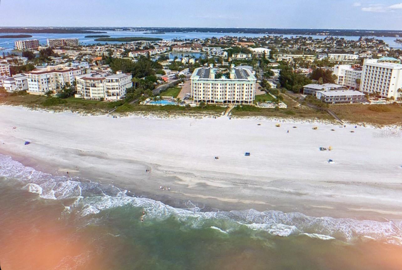 Welcome to your BEACHFRONT retreat at Sunset Vistas, one of Treasure Island's most sought-after vacation destinations. This beautifully appointed 2-bedroom, 2-bathroom condo is being offered fully furnished and turnkey, making it the perfect blend of personal paradise and exceptional investment opportunity.

Situated on the 3rd floor, this coastal sanctuary showcases breathtaking water views from its private balcony, where you'll enjoy unforgettable sunsets and soothing sea breezes, creating a seamless connection to the spectacular waterfront setting. Inside, the residence has been thoughtfully updated.  Modern comforts abound, including ice cold air conditioning, water heater, washer and dryer, an updated shower in the guest bath, and smart TVs throughout the home.

The primary suite features a king-sized bed and a private en-suite bath, while the guest bedroom offers a queen-sized bed for family and visitors. The living room provides additional accommodations with a queen sleeper sofa, allowing the unit to comfortably host larger groups. A private owner's closet offers secure storage for personal belongings, and the unit includes one assigned parking space.

Sunset Vistas is renowned for its flexible rental policy, allowing one-night minimum stays, creating outstanding potential for maximizing rental income. Owners have the flexibility to enjoy the property personally while benefiting from strong vacation rental demand year-round. Residents and guests enjoy an impressive collection of resort-style amenities, including a heated beachfront swimming pool, relaxing hot tubs, a dedicated children's splash pool with fountains, and accessible water-entry equipment. Additional amenities include an on-site fitness center, business center, café, and recently renovated beachfront gathering areas. Best of all, the community sits directly on the sugar-white sands of Treasure Island Beach, placing the Gulf just steps from your door.

Beyond the resort, the vibrant atmosphere of John's Pass Village is approximately one mile away, offering waterfront dining, boutique shopping, fishing charters, dolphin cruises, jet ski rentals, live entertainment, ice cream shops, and countless opportunities to enjoy Florida's coastal lifestyle.

Whether you're seeking a luxurious beachfront getaway, a high-performing vacation rental, or the ideal combination of both, this exceptional Sunset Vistas residence delivers an unparalleled opportunity to own a piece of paradise on Florida's Gulf Coast.
