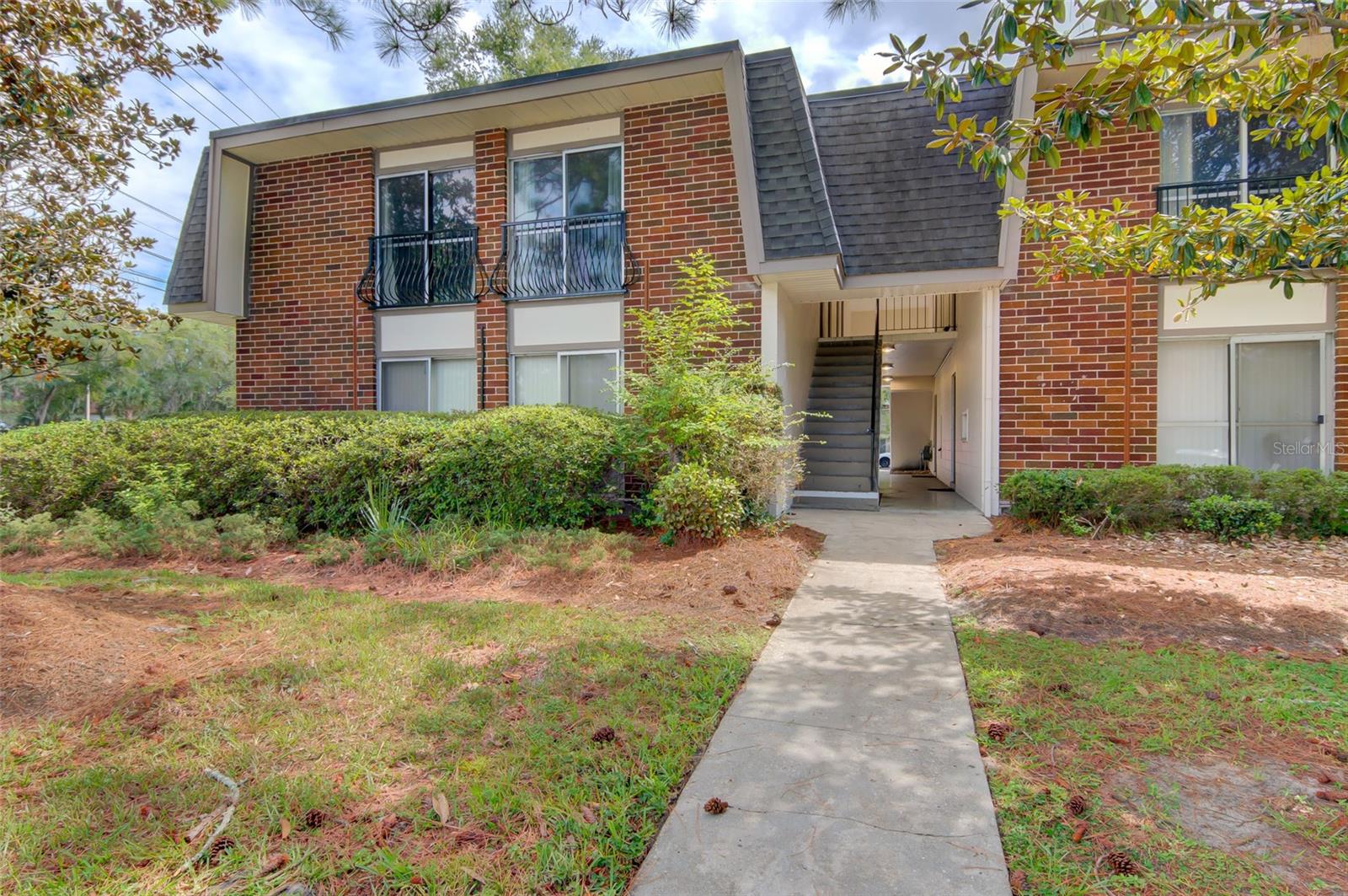 WALK TO SHANDS, UF, AND THE VA! This upgraded top floor, corner unit is one of the closest condos to UF Health/Shands Hospital. Featuring 2 bedrooms and 1 bathroom, the location is attractive for graduates and undergraduates alike. Summit House condos are in high demand by travel nurses, visitors of Shands hospital, and medical personnel or residents. It's a well-maintained community that offers its residents access to a swimming pool and convenient on-site parking. The local bus service (RTS) conveniently picks up directly in front of Summit House, making your commute quick and painless. Conventional financing is available for these great investments. Plus, the HOA covers roof repairs, building hazard insurance exterior maintenance and pest control. Don't miss out on the chance to make this charming and cozy condo your own! Condo is leased through December 15th, 2023 for $1,100/month.