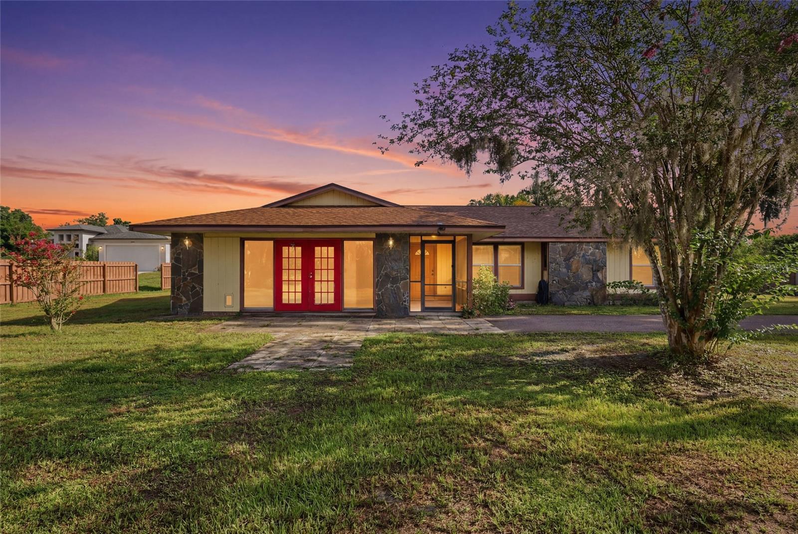 Welcome to your private oasis on an acre of serene land at 2951 Gocio Ext in beautiful Sarasota, FL! This spacious 4-bedroom, 2-bath home offers a perfect blend of comfort and potential. Nestled amidst nature, the property provides a quiet and peaceful setting — ideal for those seeking a tranquil lifestyle away from the bustle of the city. Alongside the home, you'll find a large versatile structure that can be used as a workshop, storage space, or a creative studio to suit your needs. Whether you dream of gardening, crafting, or simply enjoying expansive outdoor space, this property invites you to create your own personalized retreat. Enjoy the privacy, the potential, and the opportunity to make this property truly your own. Don't miss out on this rare chance to invest in your quiet sanctuary in Sarasota!