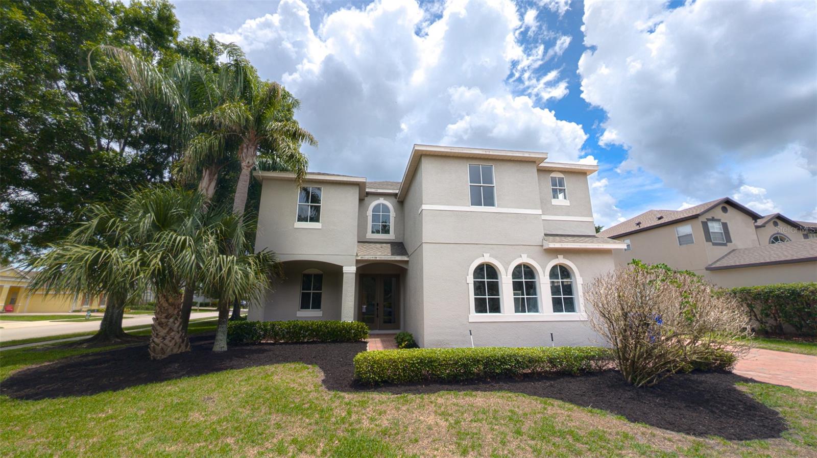 Welcome to 2835 Migliara Lane, a beautifully updated pool home situated on a spacious corner lot in the highly desirable, 24-hour guard-gated community of Westyn Bay. With over 3,500 square feet of living space, 4 bedrooms, 3.5 bathrooms, and a rare three-car garage configuration, this move-in-ready residence offers the size, upgrades, and lifestyle today's buyers are searching for.

From the moment you arrive, the home's impressive curb appeal and expansive corner-lot setting make a lasting impression. Inside, you'll find fresh interior and exterior paint, new flooring throughout, updated lighting and fixtures, and an open, functional floor plan designed for both everyday living and entertaining.

The heart of the home is the upgraded kitchen, featuring updated cabinetry, stainless steel appliances, generous counter space, and a large center island that overlooks the family room. Soaring ceilings and abundant natural light create a bright and inviting atmosphere throughout the main living areas, while multiple gathering spaces provide flexibility for entertaining, working from home, or accommodating a growing household.

The oversized primary suite serves as a private retreat, complete with a spacious sitting area, dual walk-in closets, and an updated spa-inspired bathroom featuring new vanities, a soaking tub, separate shower, and plenty of storage. The additional bedrooms are generously sized and thoughtfully positioned to provide comfort and privacy for family members and guests alike.

Step outside to your own Florida backyard oasis. The screened lanai and sparkling pool create the perfect setting for weekend barbecues, outdoor dining, and year-round enjoyment. The fully fenced yard offers privacy and space for pets, play, or simply relaxing in the Florida sunshine.

Major updates provide peace of mind for years to come, including a newer roof installed in 2023, HVAC system replaced in 2018, upgraded kitchen and bathrooms, new flooring throughout, fresh paint, and updated fixtures. The rare three-car garage offers ample room for vehicles, storage, hobbies, or recreational equipment.

As a resident of Westyn Bay, you'll enjoy access to an exceptional lineup of resort-style amenities, including a clubhouse, community pool, splash park, playgrounds, tennis courts, basketball courts, volleyball courts, soccer and baseball fields, scenic walking and biking trails, private access to Lake Apopka, and beautifully maintained common areas. Internet service is included through the HOA.

Conveniently located near SR-429, the Florida Turnpike, 408, and 414, this home provides easy access to Winter Garden Village, downtown Winter Garden, top-rated schools, shopping, dining, and major employment centers throughout Central Florida.

Combining over 3,500 square feet of updated living space, a private pool, a premium corner-lot location, and outstanding community amenities, 2835 Migliara Lane represents a rare opportunity to own one of Westyn Bay's most desirable homes.