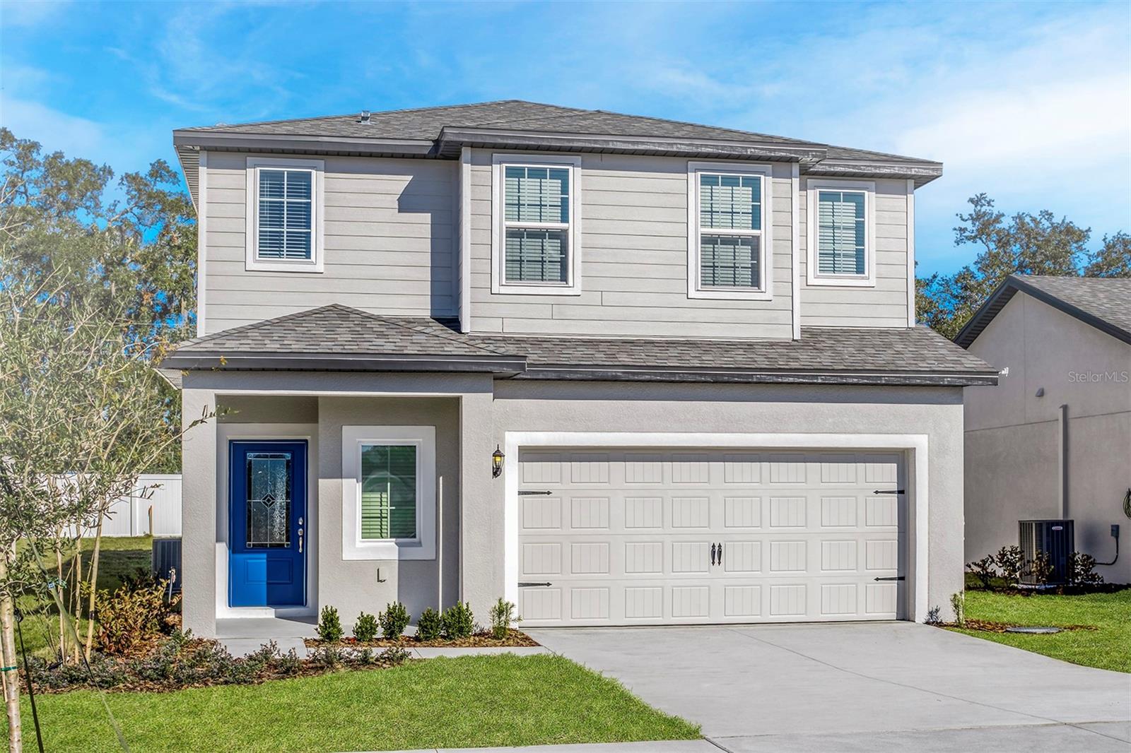 Under Construction. Welcome to the Driftwood model, a spacious two-story retreat located in the picturesque Tula Parc community of Astatula, FL, just 10 minutes from beautiful Lake Harris and Lake Astatula. This 4-bedroom, 2.5-bathroom home is thoughtfully designed to provide comfort, space, and modern style for the whole family.

Step into a bright and open floor plan featuring a chef-ready kitchen complete with a large island, walk-in pantry, granite countertops, and stunning 36” upper cabinets with crown molding. The kitchen is equipped with brand-new Whirlpool® appliances, including a refrigerator, stove, and dishwasher, along with LED flush-mount Energy Star® lighting for efficiency and style.

The main floor includes a convenient half-bathroom, perfect for guests, and a spacious living area that flows seamlessly into the dining space—ideal for entertaining. Upstairs, the luxurious master suite offers a massive walk-in closet and a spa-like bathroom with dual sinks and a step-in shower. Three additional bedrooms provide plenty of space for family, guests, or a home office setup.

This move-in ready home also includes an attached two-car garage, covered front and back porches, and light front yard landscaping that adds curb appeal to this stunning property.

Located in the scenic Tula Parc neighborhood, you’ll enjoy access to a community gazebo and playground, as well as proximity to the Chain of Lakes, Little Lake Harris, and nearby parks, perfect for boating, fishing, and enjoying Florida’s natural beauty.

Don’t miss the opportunity to make the Driftwood model your new home—schedule your tour today!