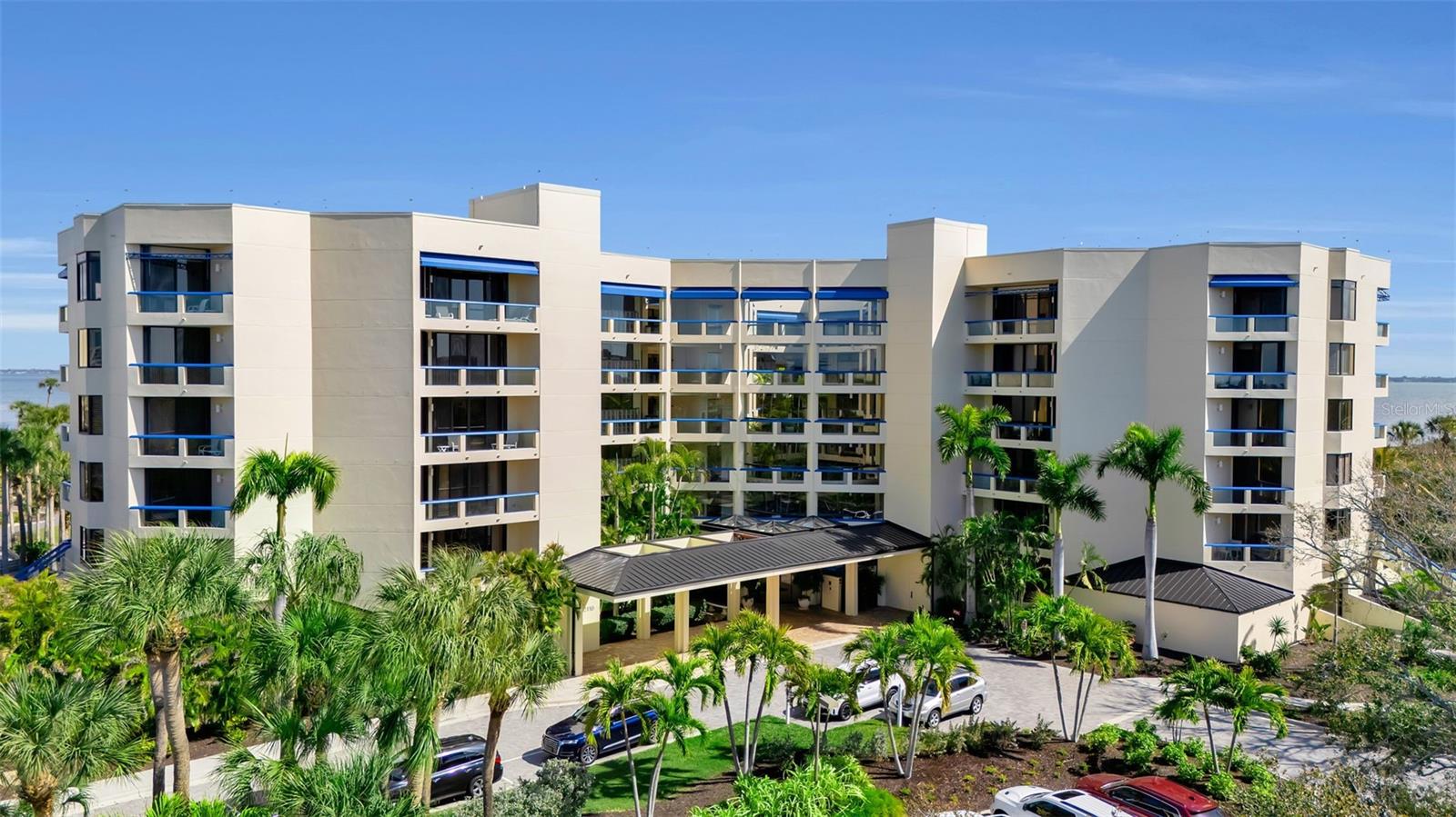 Welcome to the Atrium—one of Longboat Key's most exceptional waterfront addresses. Perfectly positioned along the sparkling waters of Sarasota Bay, this stunning three-bedroom residence offers breathtaking panoramic views that will captivate you from sunrise to sunset.
The spacious chef's kitchen is designed for both function and style, featuring abundant cabinetry, stainless steel appliances, and a double oven for the culinary enthusiast. Imagine preparing meals while gazing out at the endless blue waters of the bay—a view that never grows old. The thoughtfully designed split-bedroom floor plan provides privacy and comfort for family and guests. The expansive primary suite is a true retreat, surrounded by sliding glass doors that fill the room with natural light, welcome refreshing bay breezes, and provide direct access to the terrace where spectacular waterfront views await. This is coastal living at its finest. Ownership includes exclusive membership to the Bay Isles Beach Club, offering deeded beach access, social activities, scenic walking trails, heated pools, a state-of-the-art fitness center, tennis and pickleball courts, clubhouse amenities, and convenient kayak launches. For those seeking an even more elevated resort experience, optional membership to the Longboat Key Club provides access to championship golf, world-class Har-Tru tennis courts, a luxurious spa, waterfront dining, and a deep-water marina. Perfectly situated just minutes from St. Armand's Circle and downtown Sarasota's vibrant arts, shopping, and dining districts. Location, location, location is number one in Real Estate and this unit gets the award.