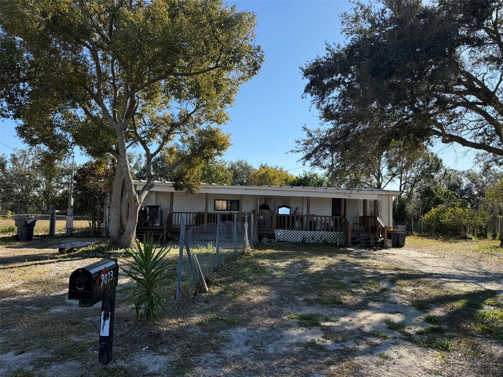 Mobile home located on a spacious lot in a quiet and private setting, surrounded by nature. The property features a front porch with roof and ample outdoor space, offering great potential for customization or future improvements. Suitable for both owner-occupants seeking space and privacy, as well as investors looking for value and upside potential. Convenient access to main roads and nearby amenities.