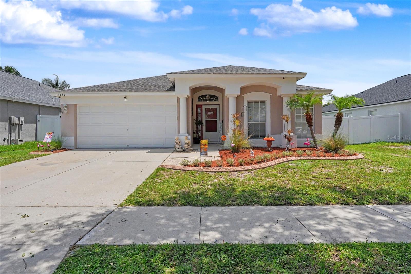 A BACKYARD PARADISE!! This Home is what Florida is ALL about; Great Open Floorplan But wait there is so MUCH more...no carpet all wood planked Tile throughout even on the Screened in Lanai. Split bedroom layout allows everyone their own spaces with primary suite in the back of the house. The Primary is a retreat in itself, with walk-in closet, an ensuite bathroom with dual sinks, private privy, along with the rejuvenating soaking tub, and a separate shower. Your culinary ideas will come to life in this Kitchen complete with granite counters, Breakfast Bar and a large Pantry. NOW lets Step outdoors to YOUR own outdoor oasis. As you relax on an extended screened lanai, complete with ceiling fans where the sparkling Pool will  continue to entice you surrounded by pavers, this becomes the focal point for your Backyard Oasis. The large fenced yard gives you the privacy and feeling you are in a Resort, designed relaxing and entertaining. Centered around the poolside paradise are two separate pergolas, offering your outdoor Kitchen area for grilling, seating and most of eating. Your 2nd one has a peaceful fire pit with seating for great conversations on those cool Florida evenings. South Cove at Summerfield Community is a great Neighborhood strategically located to schools, highways, hospitals, dining establishments, and shopping venues. Free of CDD fees, this Community boasts a lavish array of amenities: three community pools, indoor and outdoor basketball courts, a fitness center, a dog park, playgrounds, versatile meeting rooms available for rent, sports fields, and a year-round calendar of community events. So don't wait to see this home and start planning your poolside events!