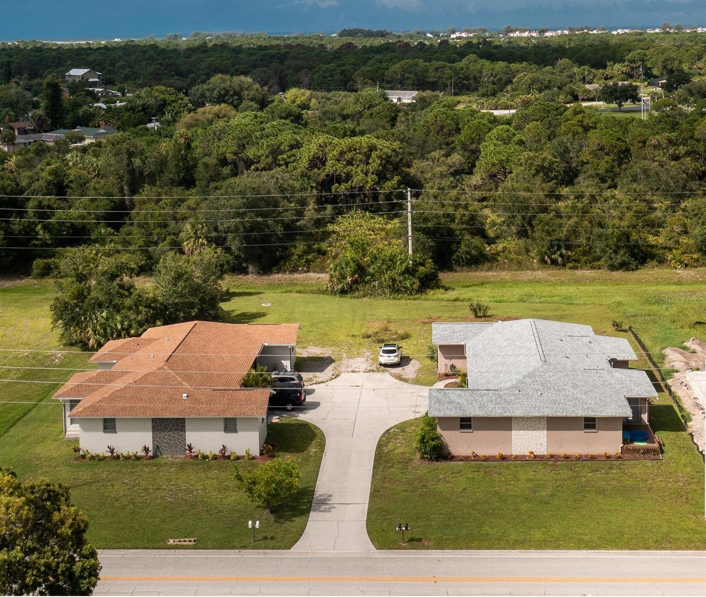 Fully leased and generating immediate income! This well-maintained duplex features two 2-bedroom, 2-bath units, each with a 1-car garage, making it a turnkey addition to any investment portfolio. Tenants pay all utilities, and major updates include a 2023 roof and 2018 A/C units and water heaters. Each unit offers an indoor laundry room, tile flooring in the main living areas, newer carpet in the bedrooms, sliding glass doors leading to composite decks, and functional, tenant-friendly layouts.  Located in desirable Rotonda West, residents enjoy access to multiple golf courses, 26 miles of canals for fishing, a community boat ramp, and easy access to five of Southwest Florida's most beautiful beaches. Looking to expand? The adjacent duplex is also available for purchase, offering the opportunity to own side-by-side income properties with space to add a pool and create a resort-style rental investment.