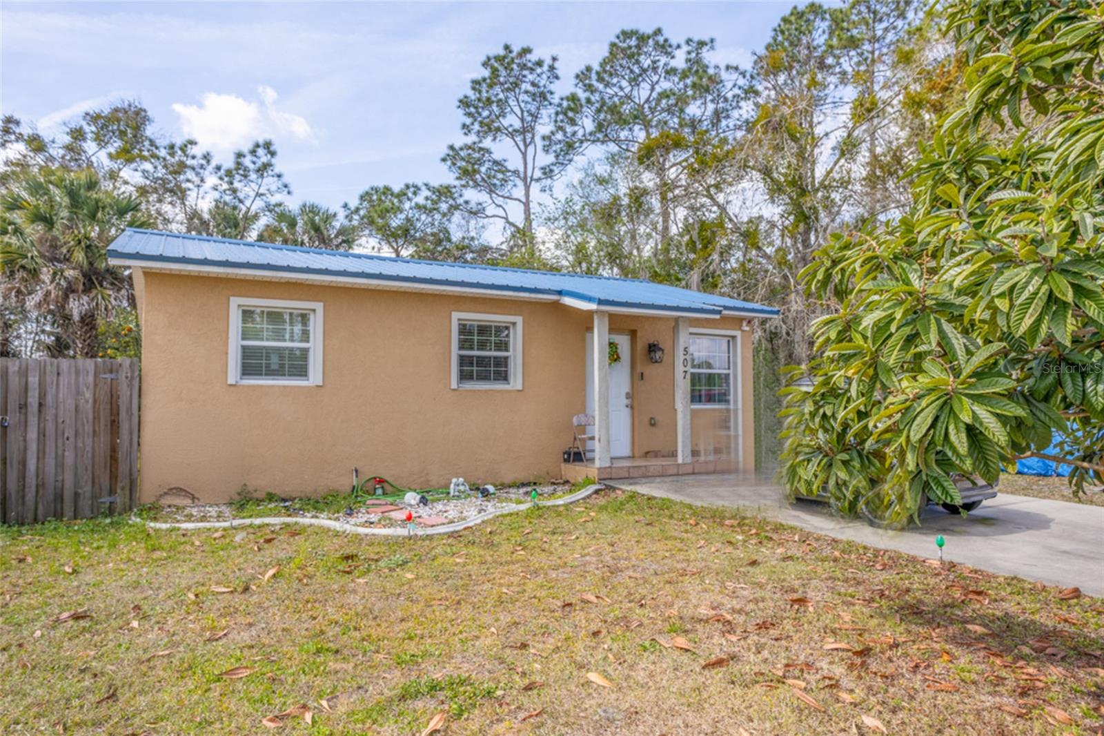THIS HOME IS USDA ELIGIBLE -- little to no money down for a qualified buyer!  Or, you can assume the current loan with a low APR.  Charming and affordable 3-bedroom, 2-bath home in the heart of Bunnell! Offering 736 square feet of efficient living space, this property had a complete remodel in 2019 with new windows, A/C, flooring, water heater, security system and even a new fence.  The metal roof was updated in 2025 —providing peace of mind and low maintenance for years to come. The large back yard offers privacy and room to enjoy the outdoors.  Ideal as a rental investment or a perfect starter home opportunity. Bunnell Park is just down the street and the George Washington Carver Community Center is a block away.  Conveniently located near shopping, schools, and major roadways. Don’t miss this value-packed property!